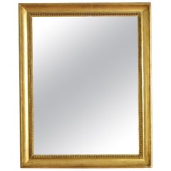 Espejo de madera dorada y gilt-gesso tallado de la época del Imperio italiano, principios del siglo XIX