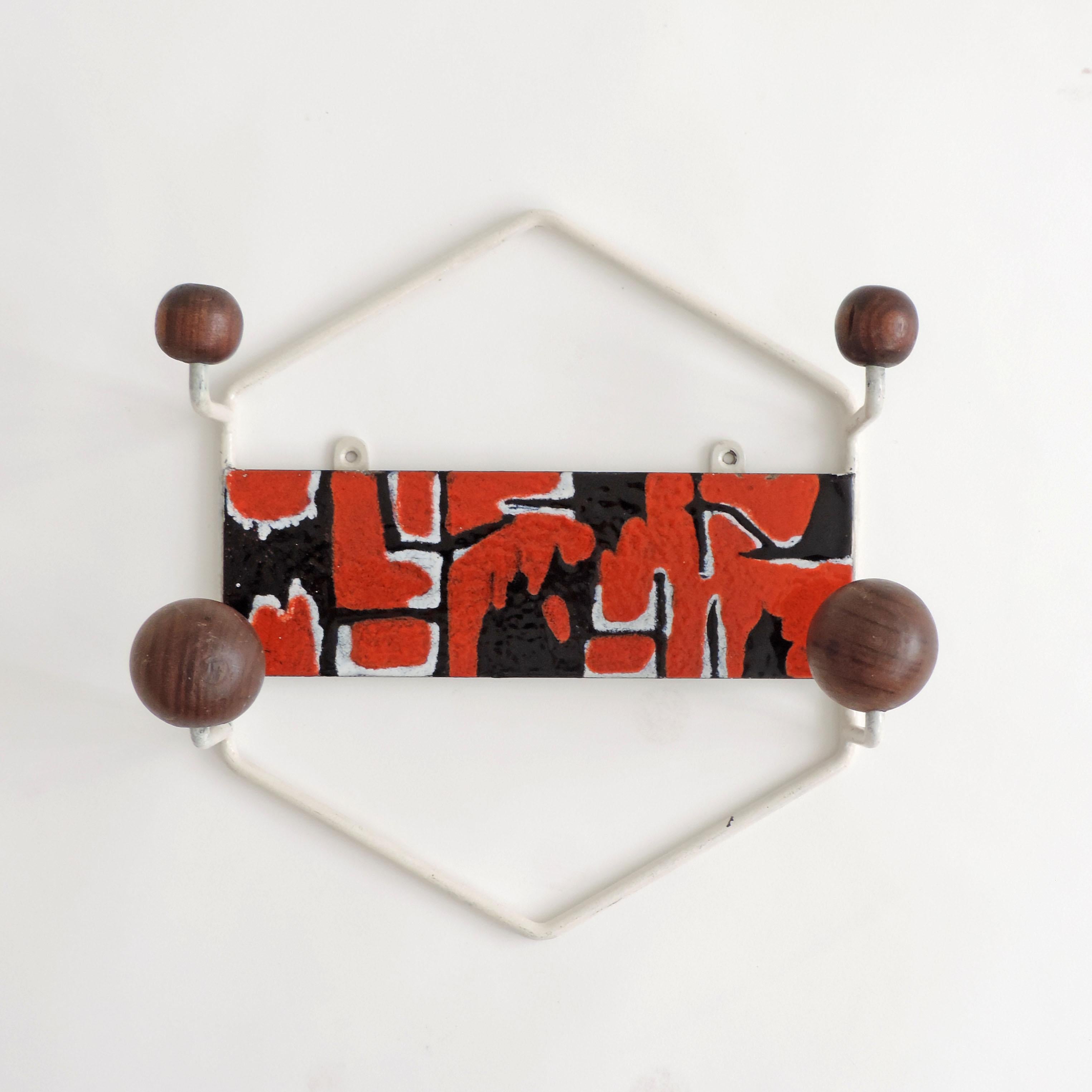 Italian Enamel decorated wall coat hanger, 1960s
Painted metal, Enamel paint and wood.