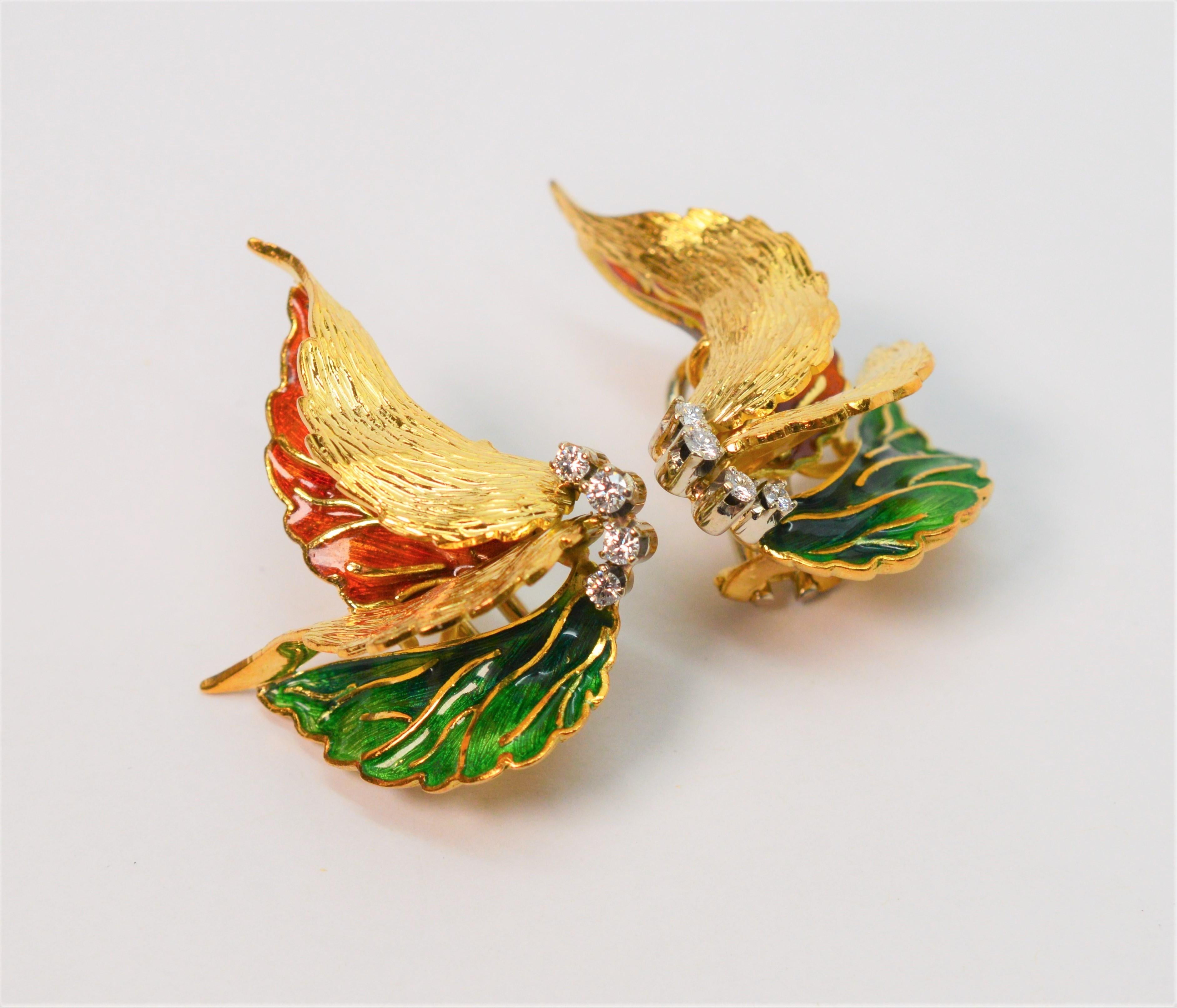 Hand painted Sienna and fern green enamel leaves of sculpted eighteen karat 18K yellow gold create the unique form of these artful vintage earrings. 
Each is accented with four bright .04 carat H/VS fine round faceted diamonds, .32 carats total