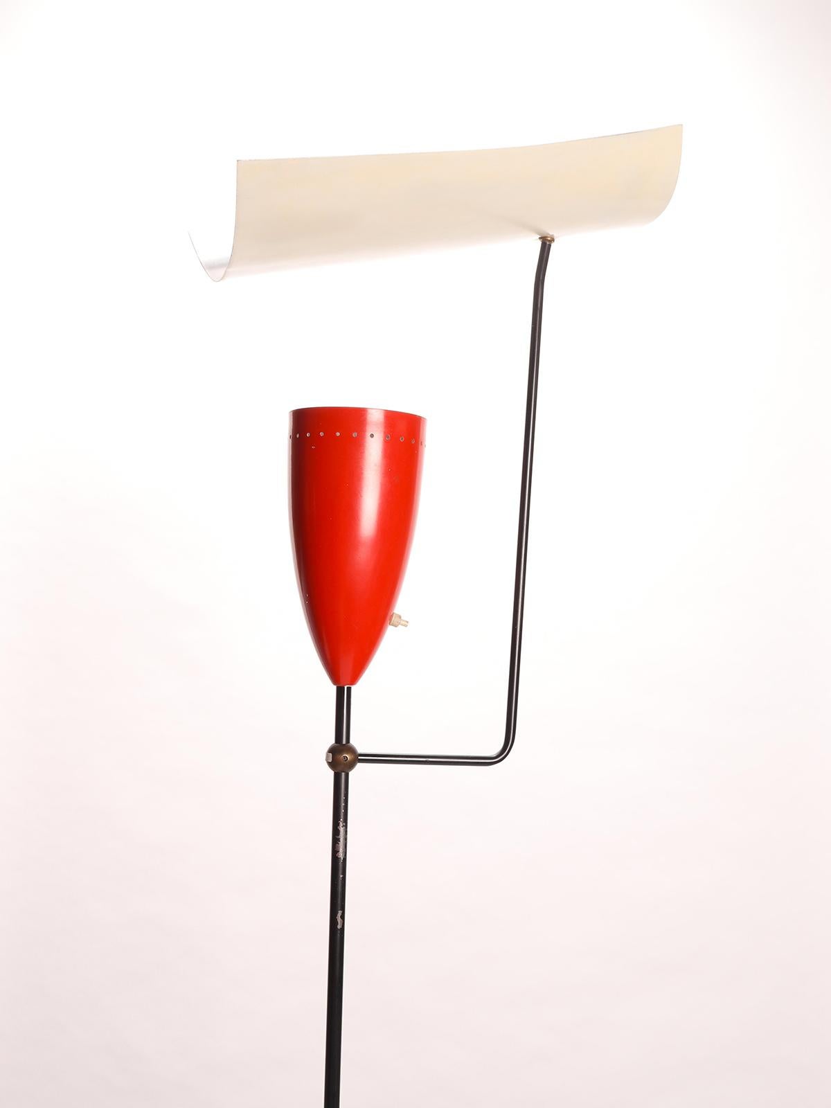 Unusual Italian floor lamp, made out of enameled black and red aluminum, with gilded brass elements. early '50.