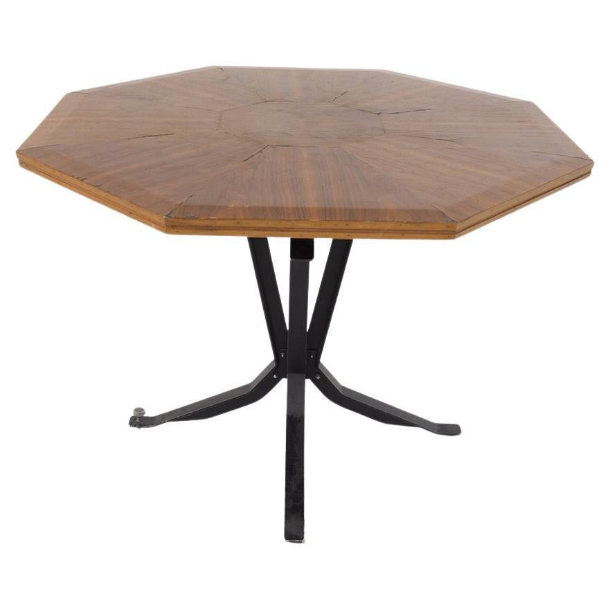 Important Italian table designed by the great architect Ignazio Gardella in the 1950s. The table has a hexagonal shape and its top is made of wood veneer. Elegant in its form, the table top's sinuous veins of wood lend importance to its design. At