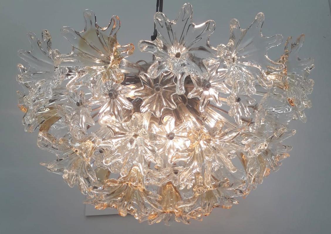 Rare Italian vintage Esprit flush mount by Venini. Hand blown clear and amber infused Murano glass flowers and stars, mounted on nickel frame / Designed by Venini circa 1970’s / Made in Italy 
10 lights / E12 or E14 type / max 40W each
Diameter: