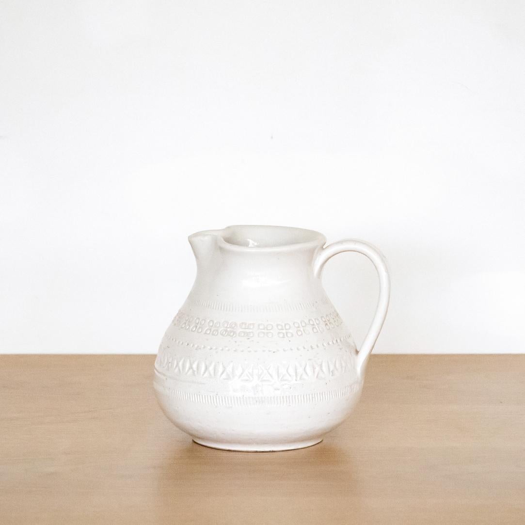 Beautiful Italian ceramic white pitchers with geometric etched design by Bitossi. Stamped 