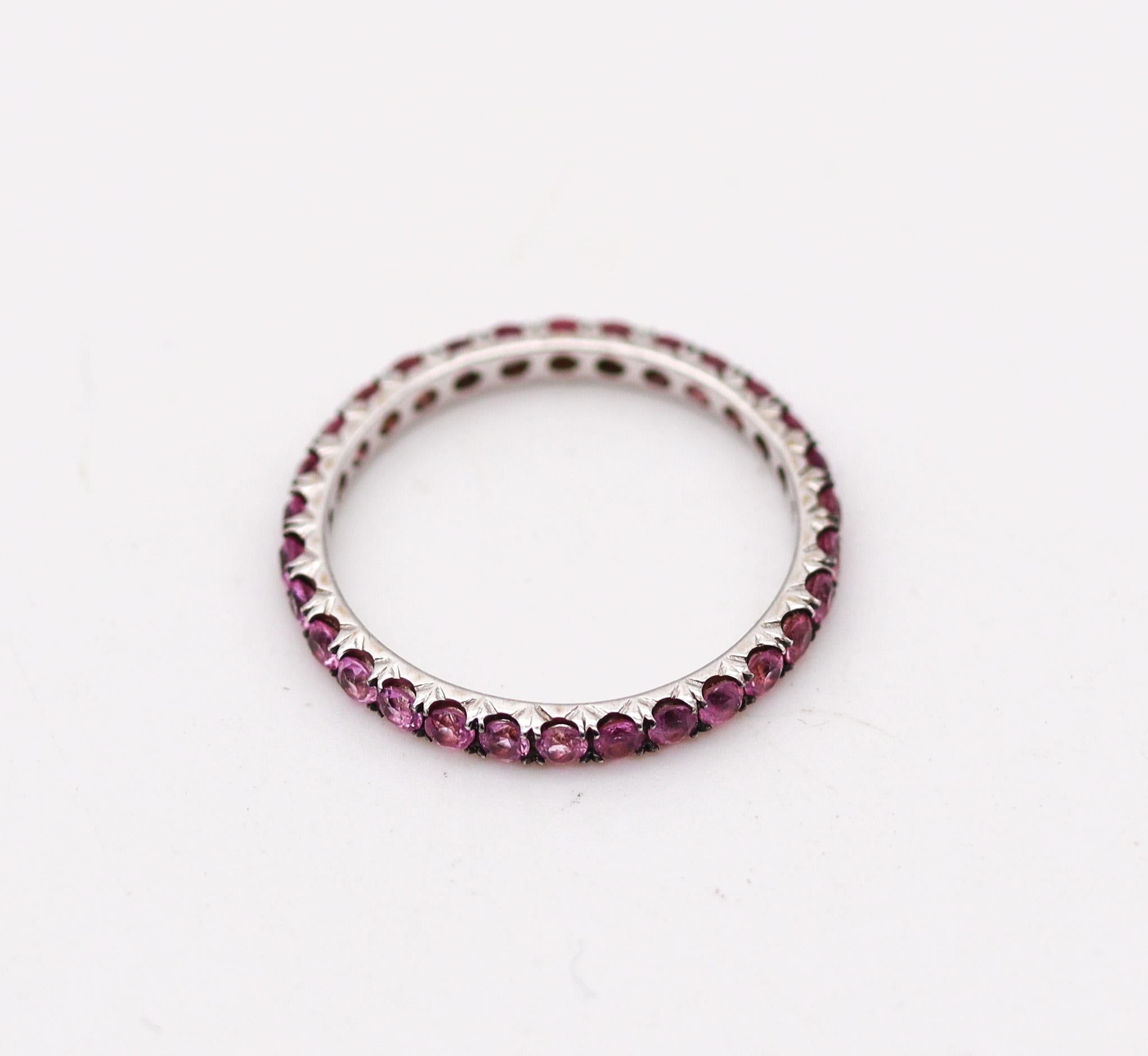 Modernist Italian Eternity Ring Band In 18 Kt White Gold With 1.20 Ctw In Pink Sapphires For Sale