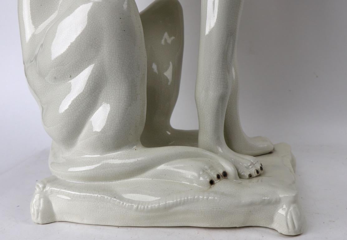 ceramic greyhound statue