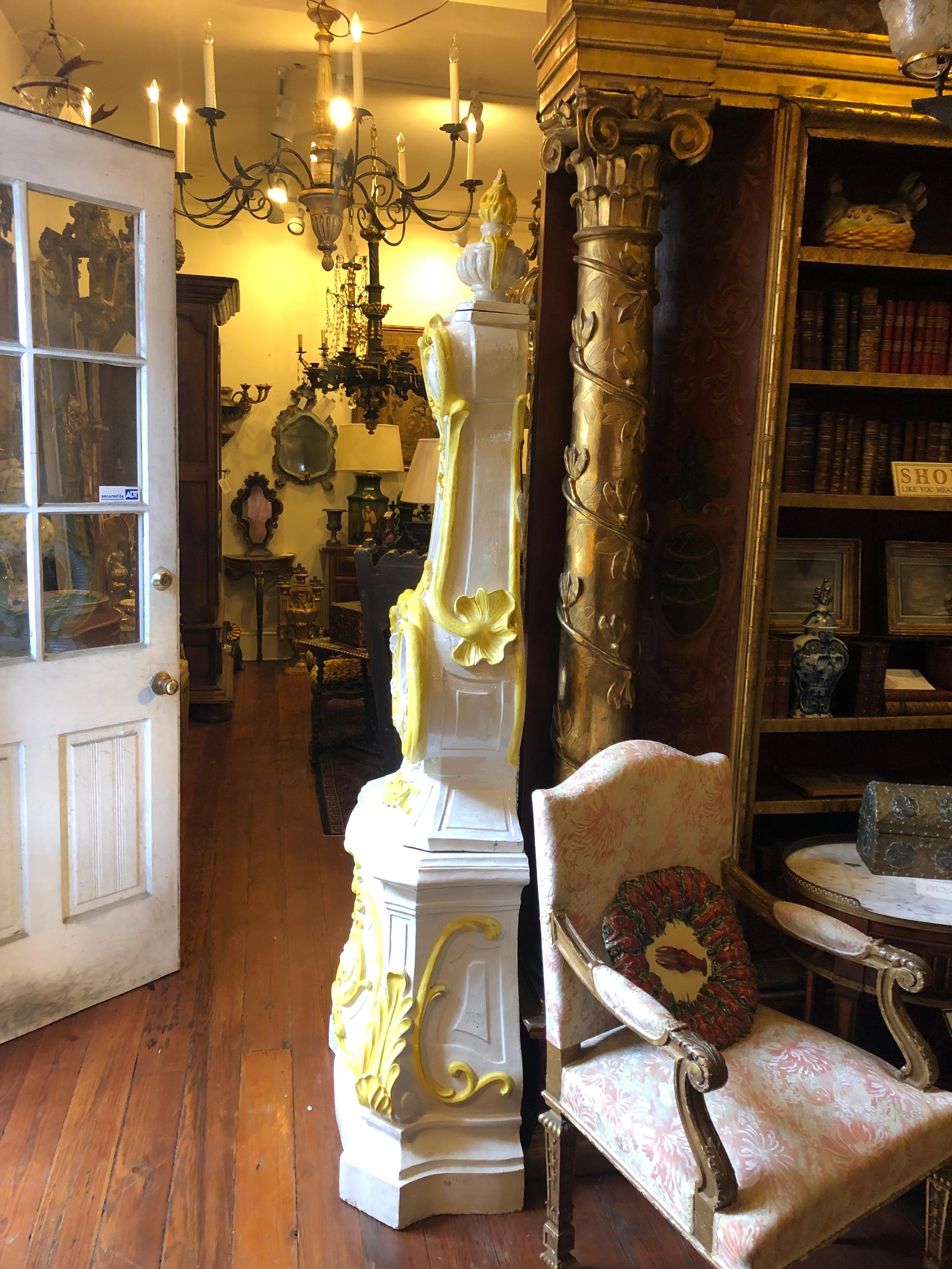 Italian Faience chimney glazed in white and yellow 19th century in three pieces.