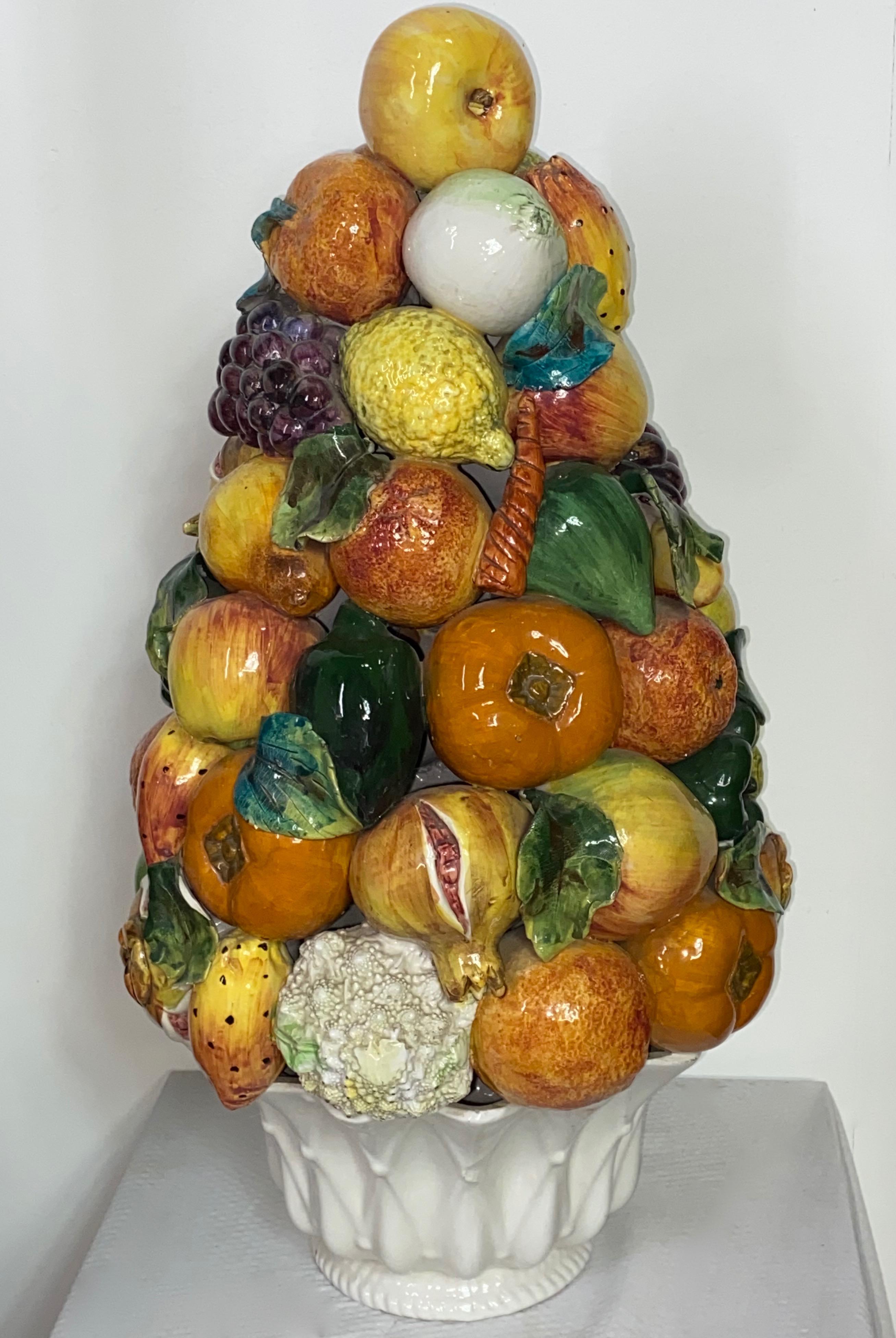 Large colorful glazed ceramic mixed fruit topiary made by the Bassano Zortea studio in northern Italy.
Mid 20th century, circa 1950.

Measures: 22” high, 13” wide.