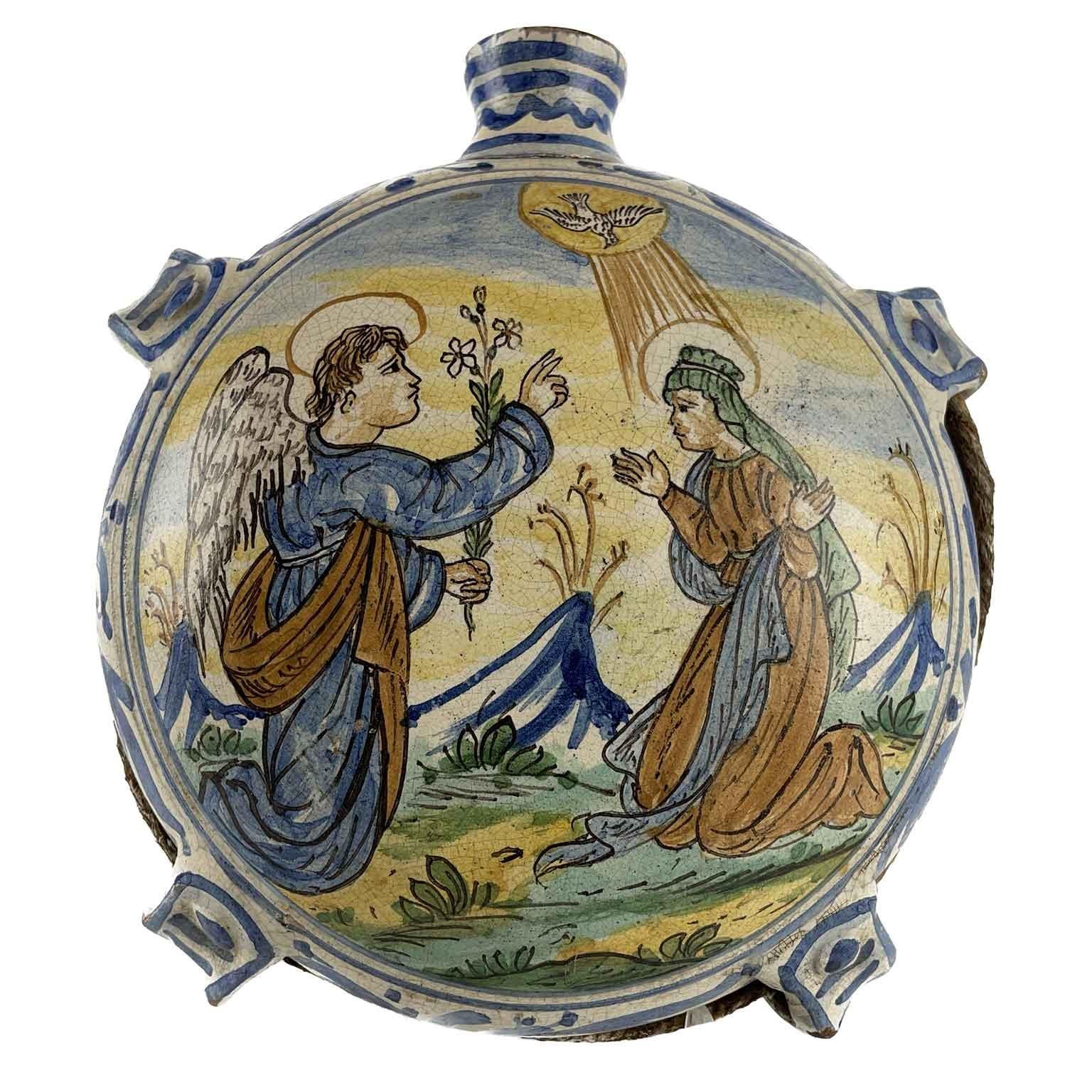 A lovely pair of 19th century ceramic pilgrim flasks of Italian origin, from Central Italy and dating to approximately 1820, realized in a Renaissance Revival style. Both vass are done in a very thick ceramic, the flattened ovoid sides painted with