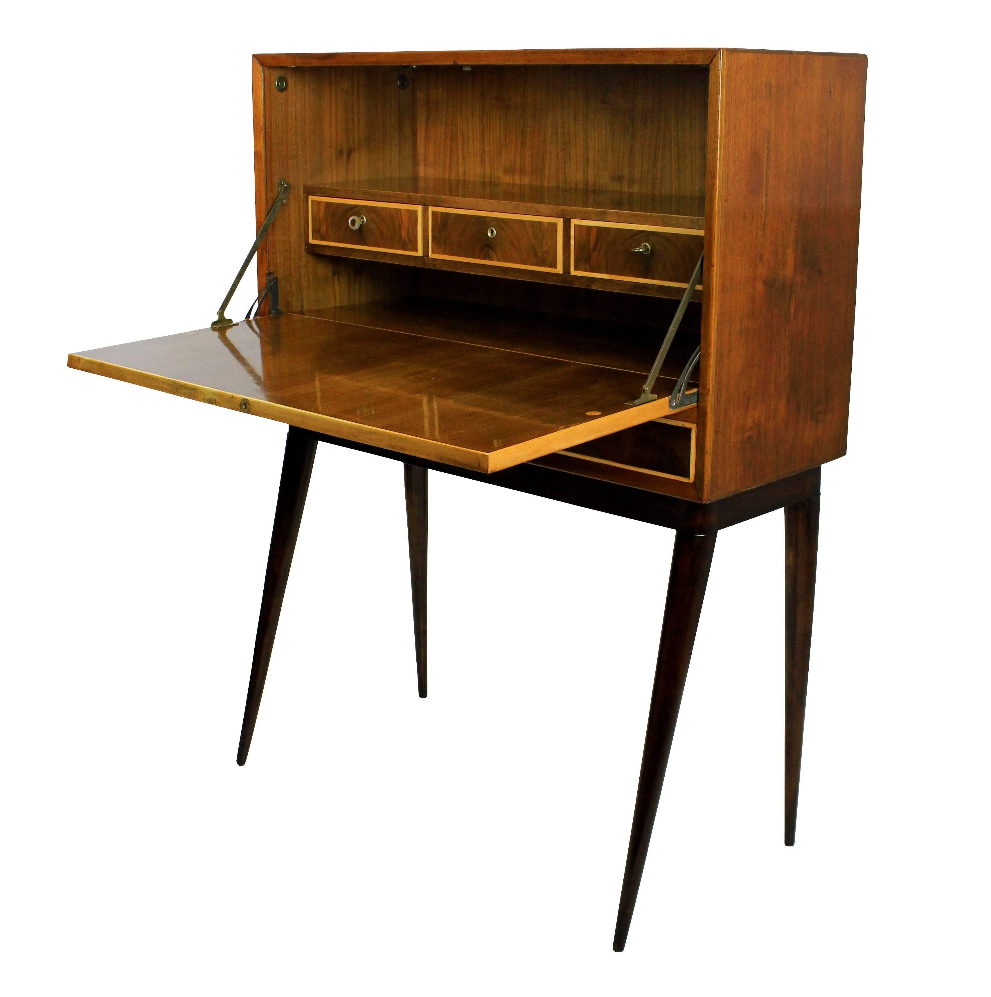 An Italian fall front desk of stylish design, with drawers inside and two drawers beneath: all with their own key.

     