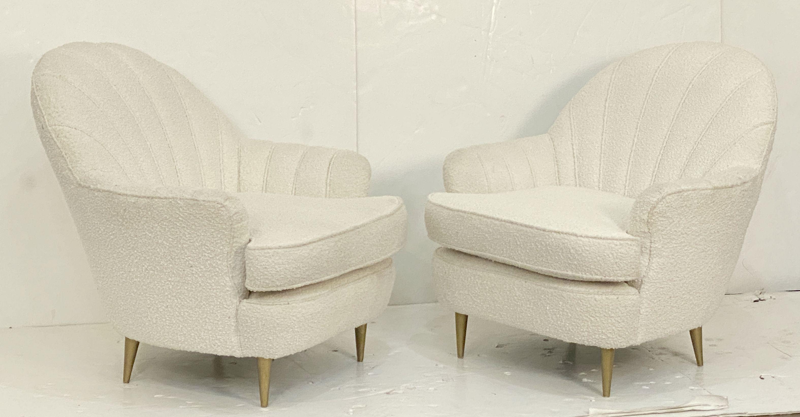 A pair of comfortable Italian lounge chairs with elegant Art Deco fan back accents - each chair featuring re-upholstered back and seat in boucle fabric, on tapering legs. 

Seat H 18 1/4 inches

Two available - Priced individually - $6895 each chair