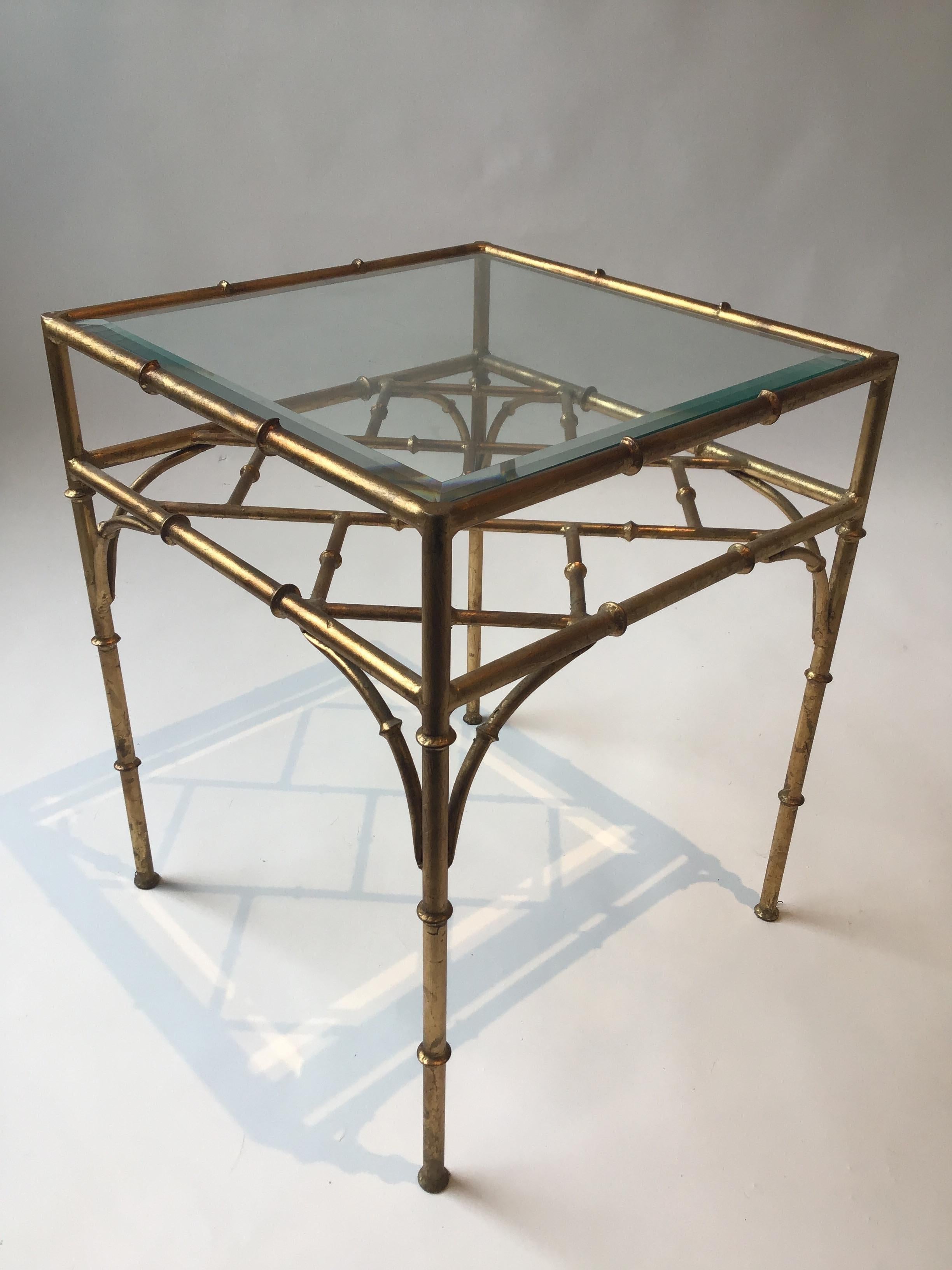 Italian faux bamboo side table. Beveled glass top.