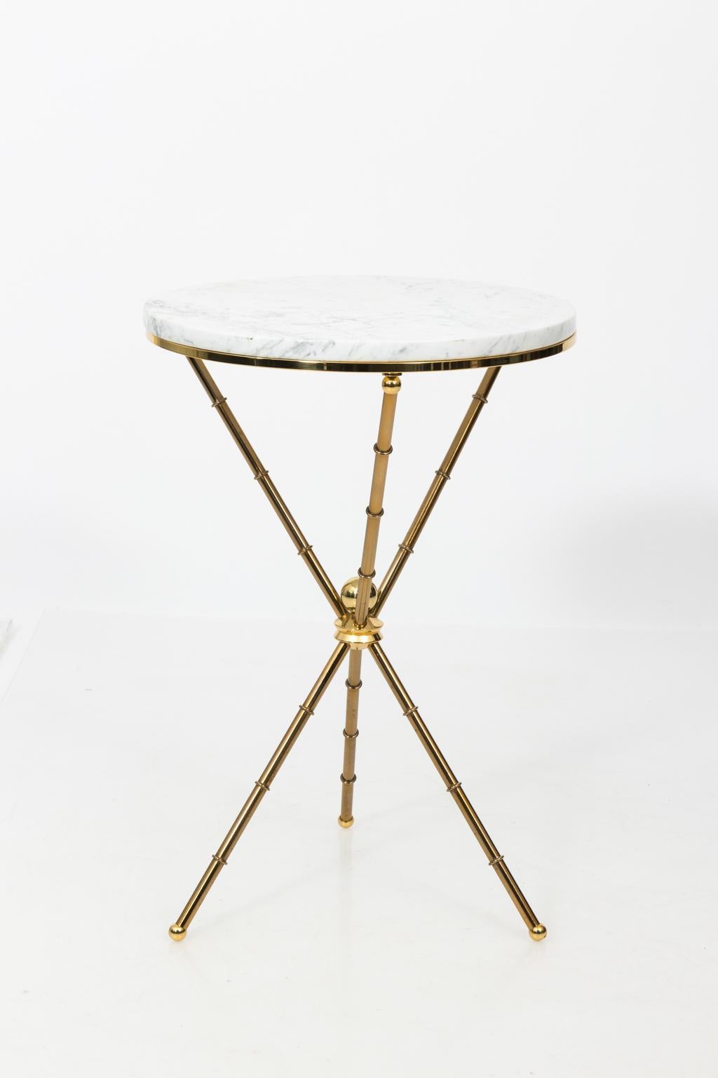 Italian faux bamboo side table with a marble top and tripod base, circa mid-20th century.