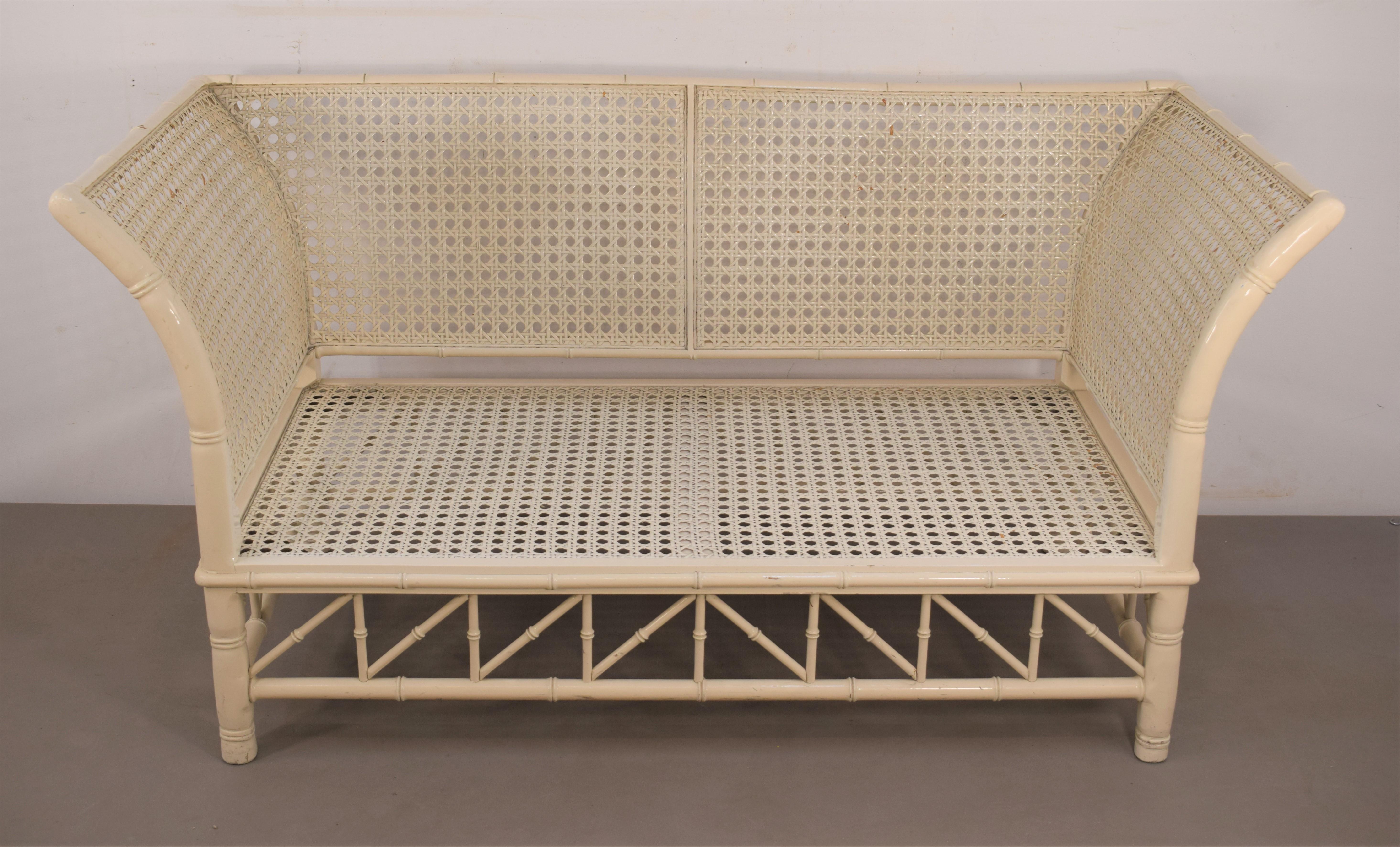 Italian faux bamboo sofa, 1970s.
Dimensions: H=75 cm; W=148 cm; D= 69 cm; seat height= 30 cm.