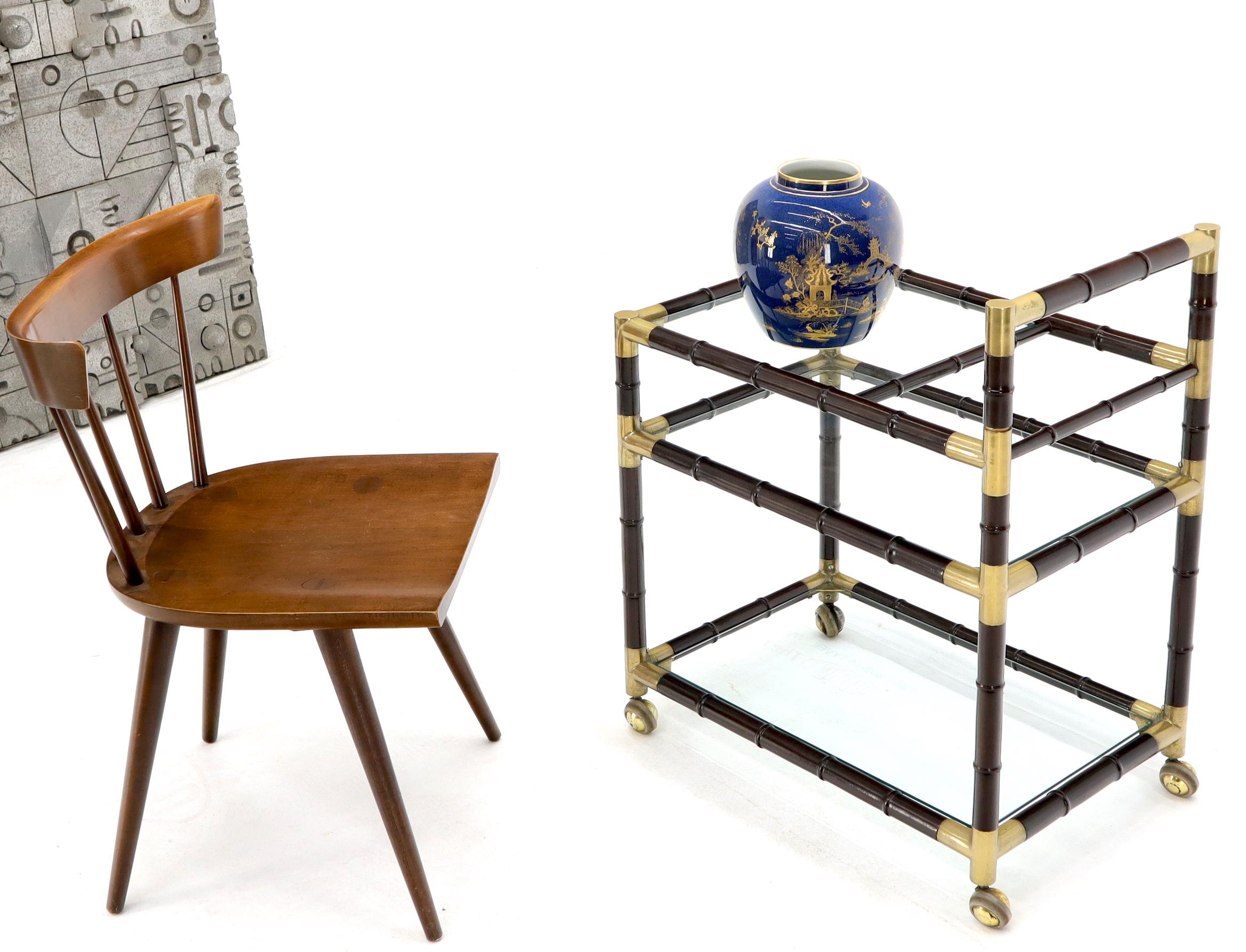 High end quality Italian Mid-Century Modern brass and turned faux bamboo rolling serving cart.