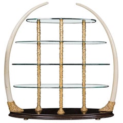 Italian Faux Elephant Tusk Étagère Bronze Structure Crystal Shelves, 1950s