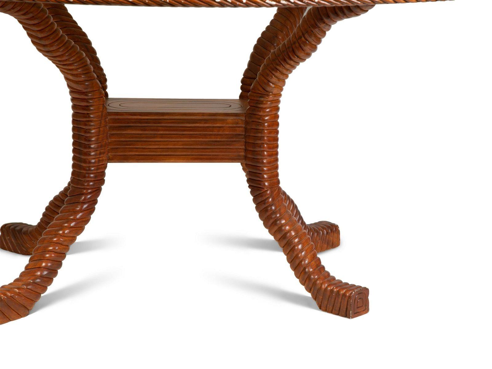A super chic 20th Century style Italian Faux-Painted and Rope Carved Dining Table in overall good vintage condition.