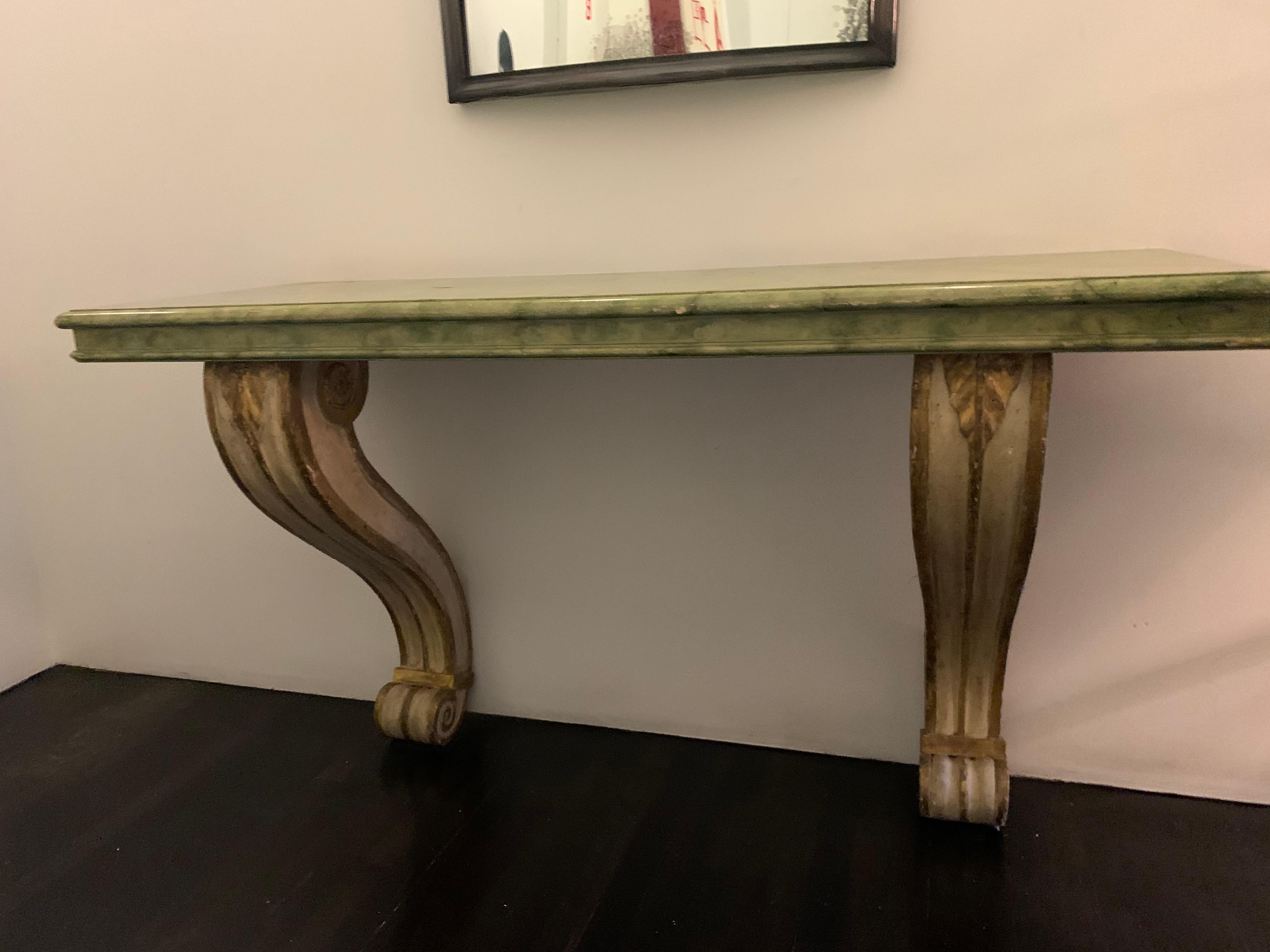 Italian faux finish console table. Decorative painted console that looks like it came out of a 20th century Italian villa. 

Property from esteemed interior designer Juan Montoya. Juan Montoya is one of the most acclaimed and prolific interior