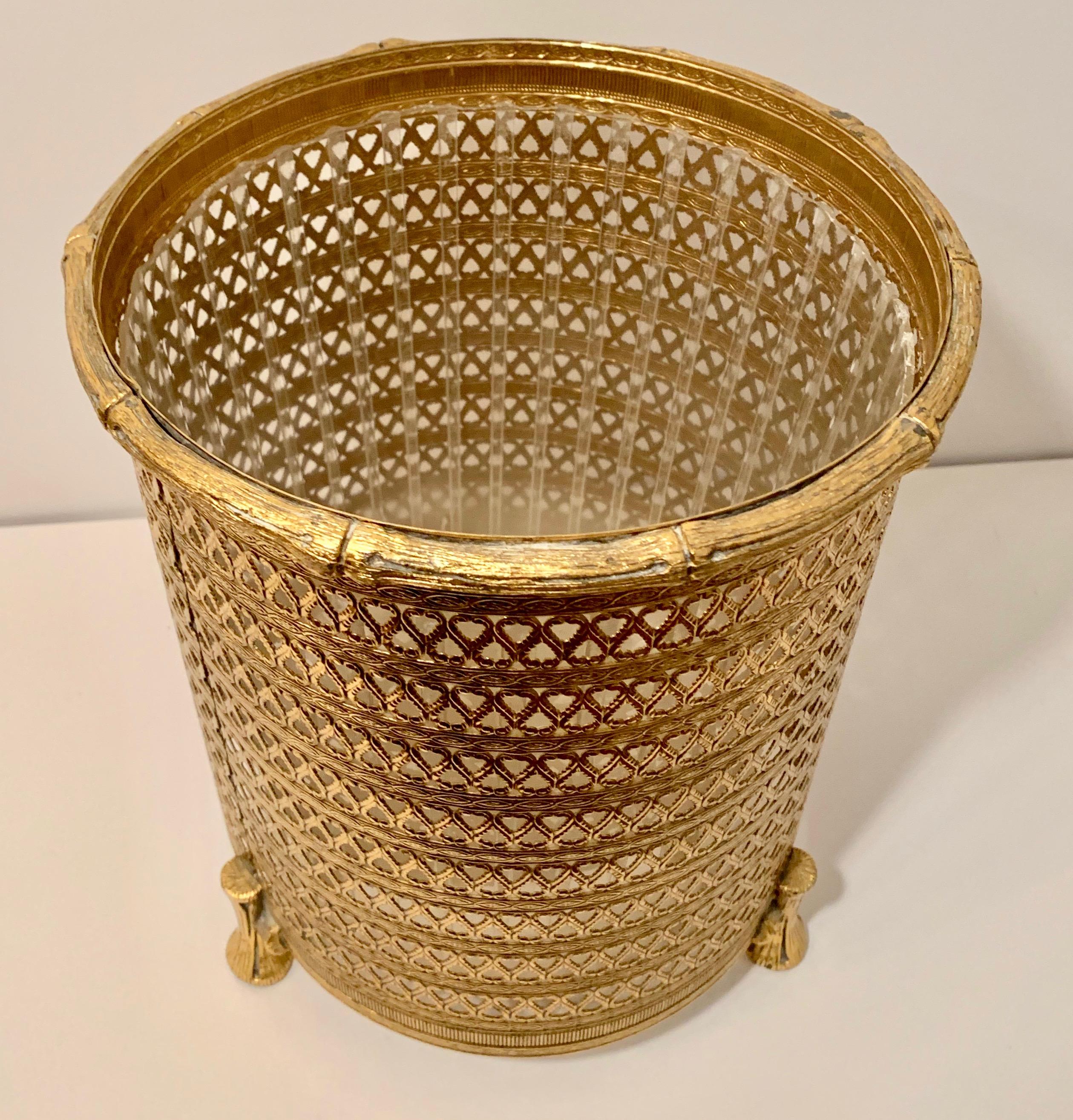 Italian Filagree brass waste bin with liner, a lovely shiny brass with bamboo accents on rim and feet, simple and elegant for any room, and wonderful for the office and bathroom. A plastic liner is nearly unable to see but makes removing trash easy