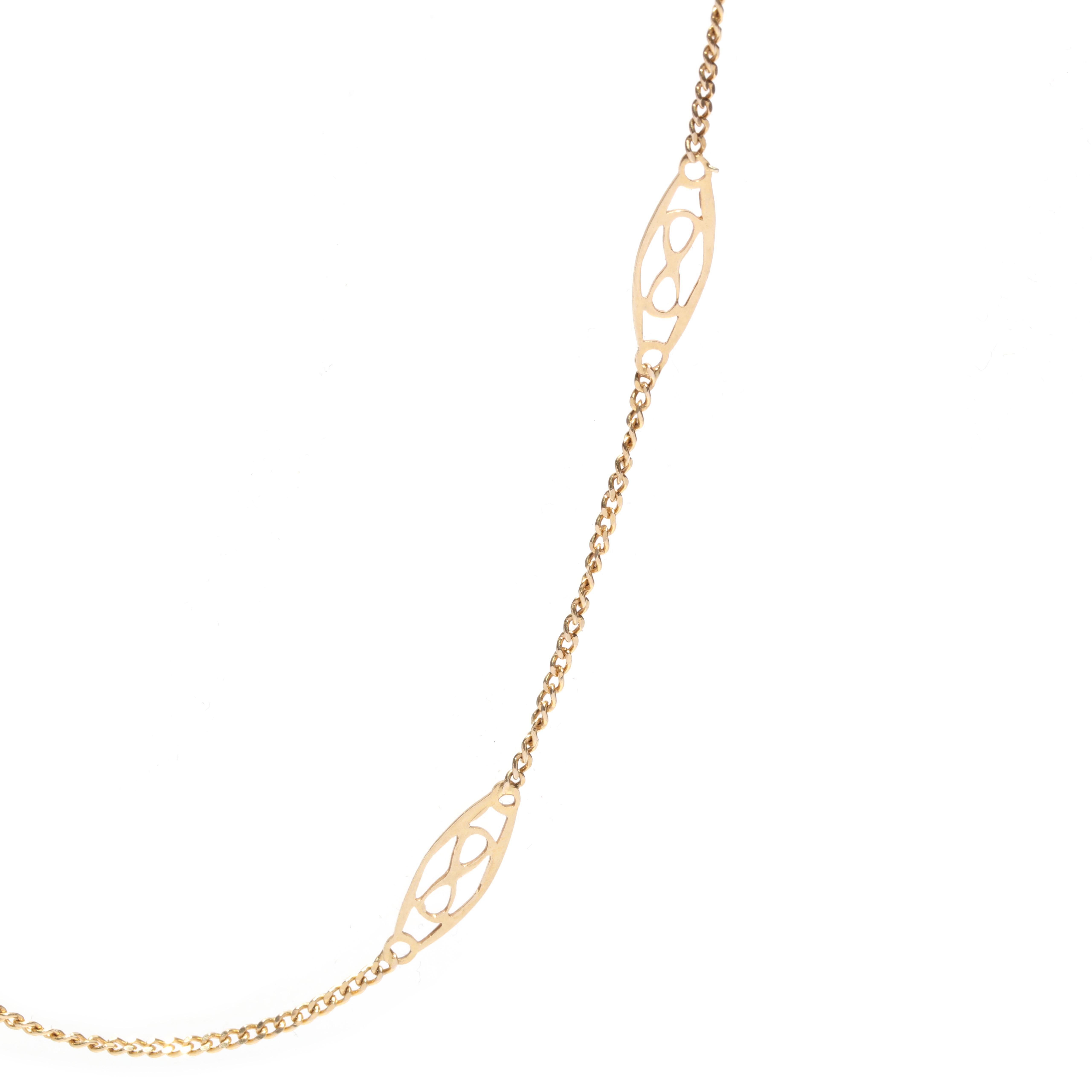 A vintage Italian 14 karat yellow gold filigree navette link chain necklace. This fancy pendant chain features a thin curb link chain with filigree navette links and a spring ring clasp.

Length: 18.25 in.

Navette Width: 4.2 mm

Chain Width: 1.2