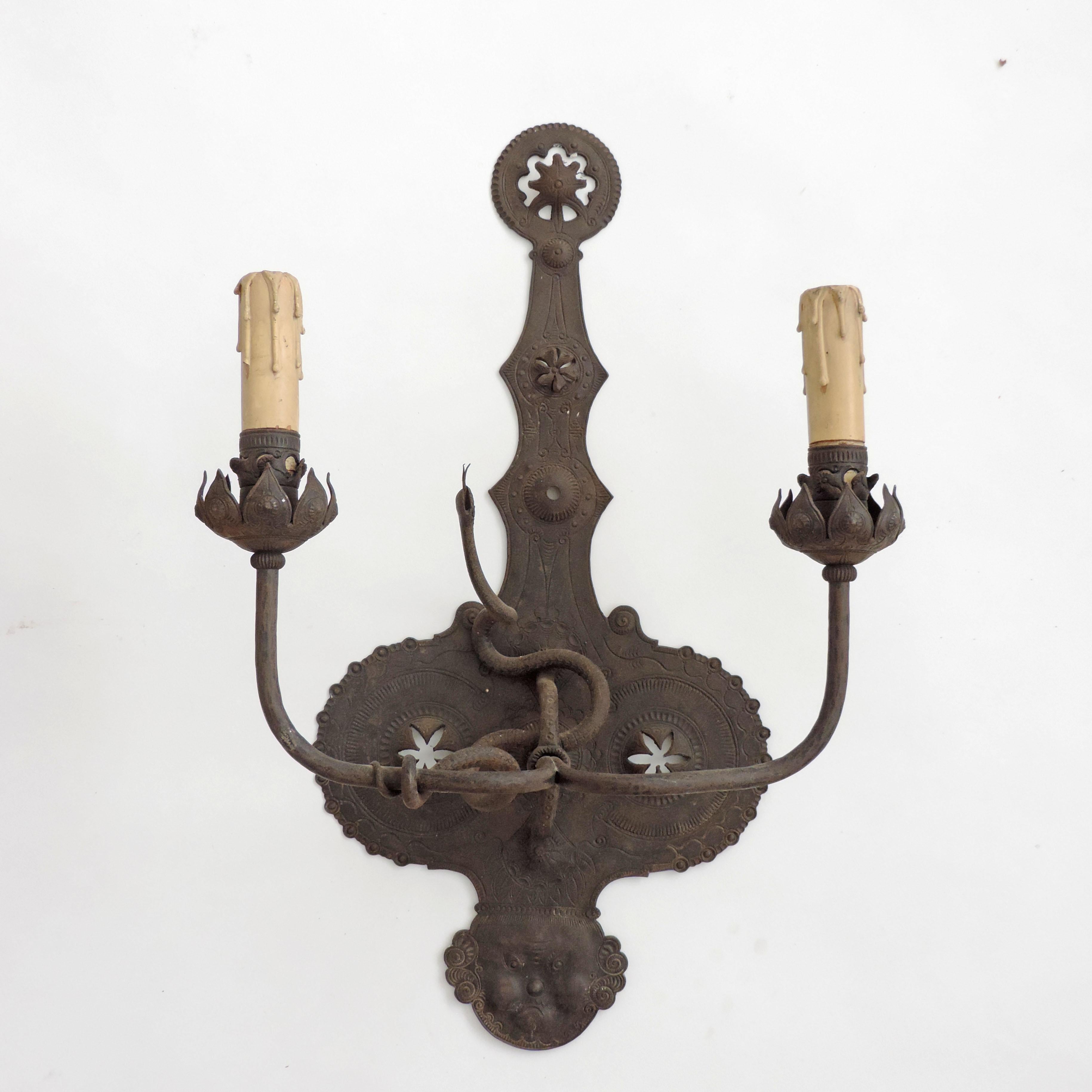 Italian finely engraved and beautifully made Art Deco wrought Iron appliques Each applied with a different undulating positioned snake.
One has a Masculine face at the base and the second a Feminine face.
A rare example of the finest in Italian