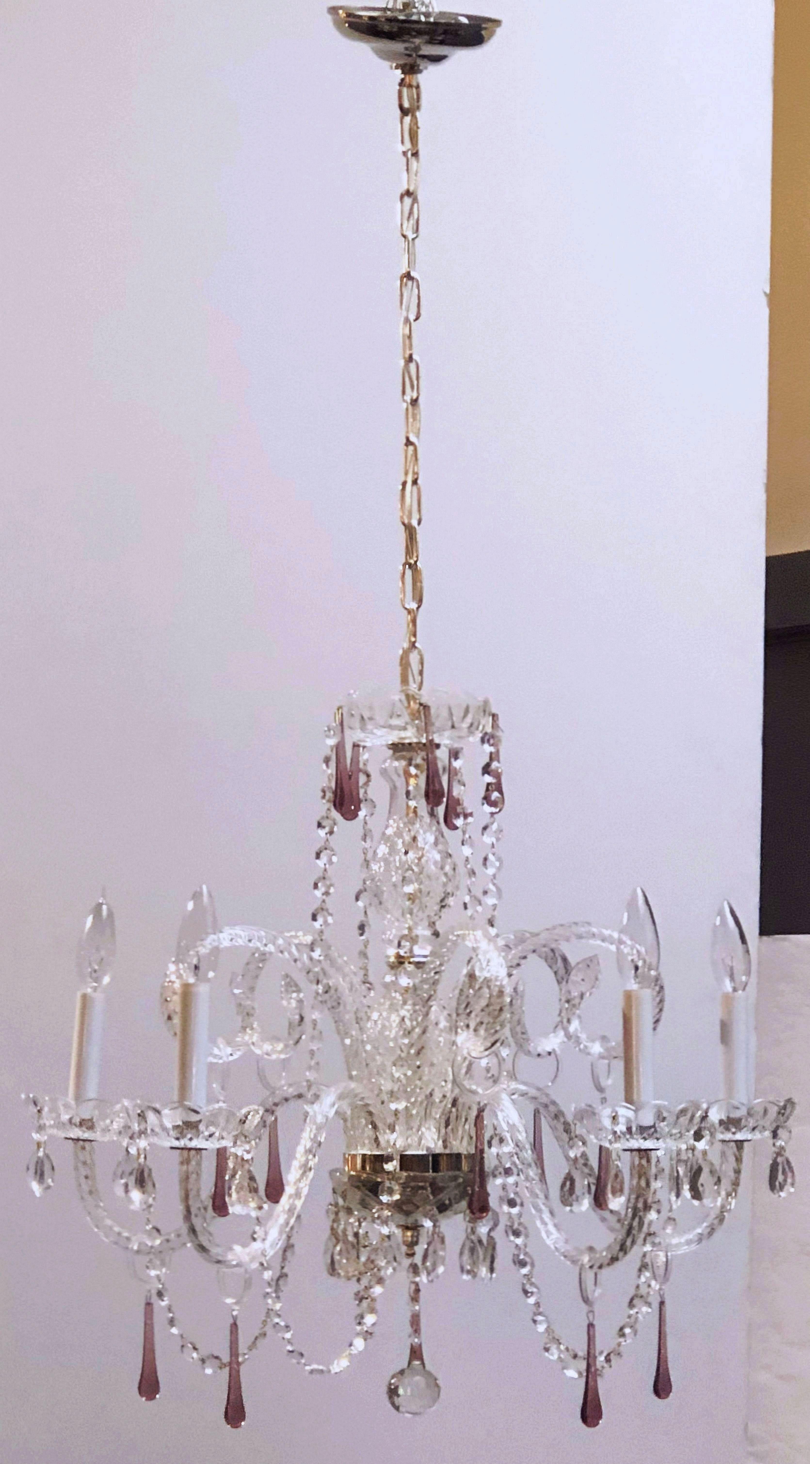 A lovely large Italian five-light chandelier (or hanging fixture) of Venetian crystal, glass, and silver metal, featuring serpentine arms, each candle light with dangling amethyst glass pendants and decorative bobeche.

Measures: 24 inches