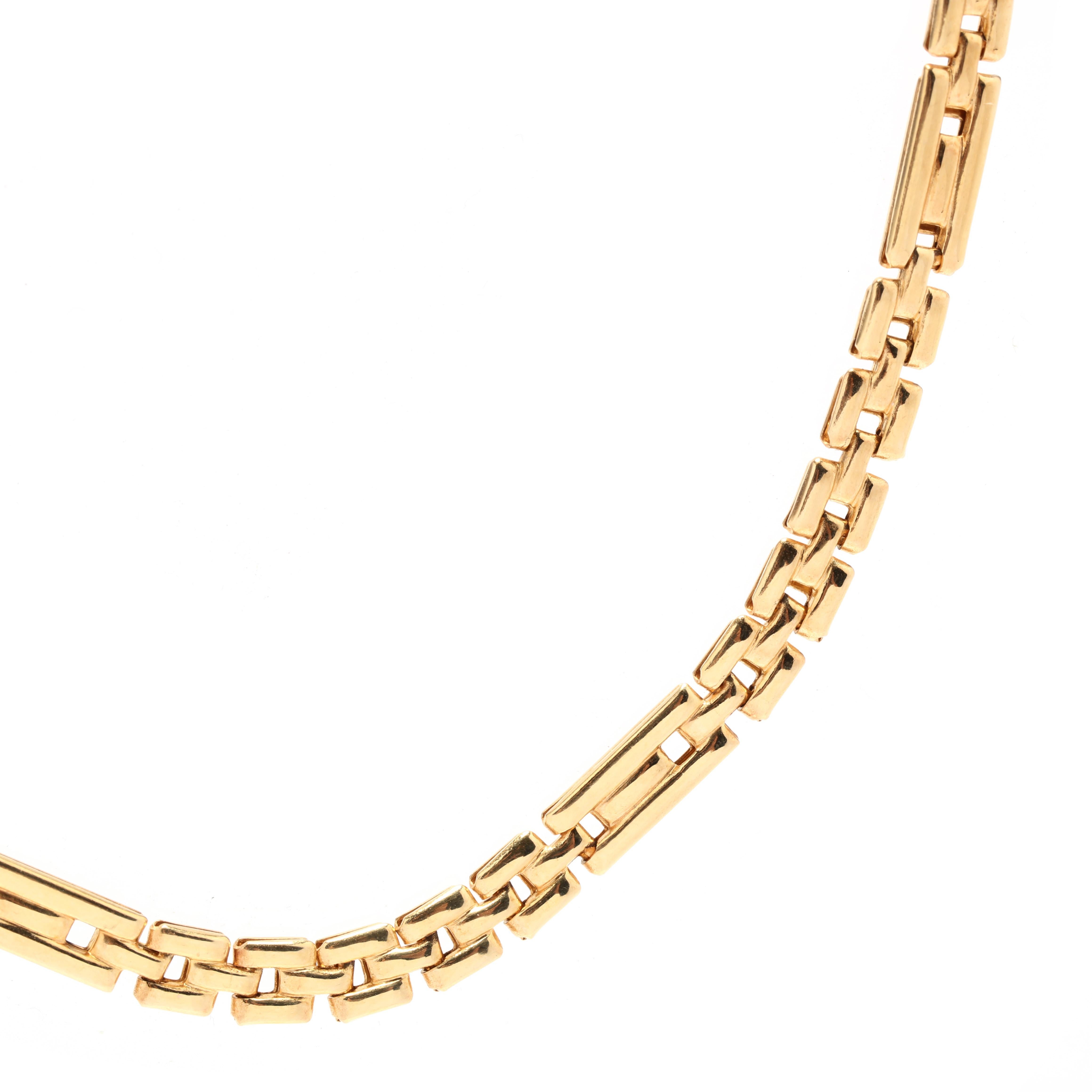A vintage 18 karat yellow Italian gold flat panther link chain necklace. This simple necklace features a flat design of alternating short and long rectangular links and with a lobster clasp.

Length: 17 in.

Width: 4.2 mm

Weight: 7.8 dwts. / 12.13
