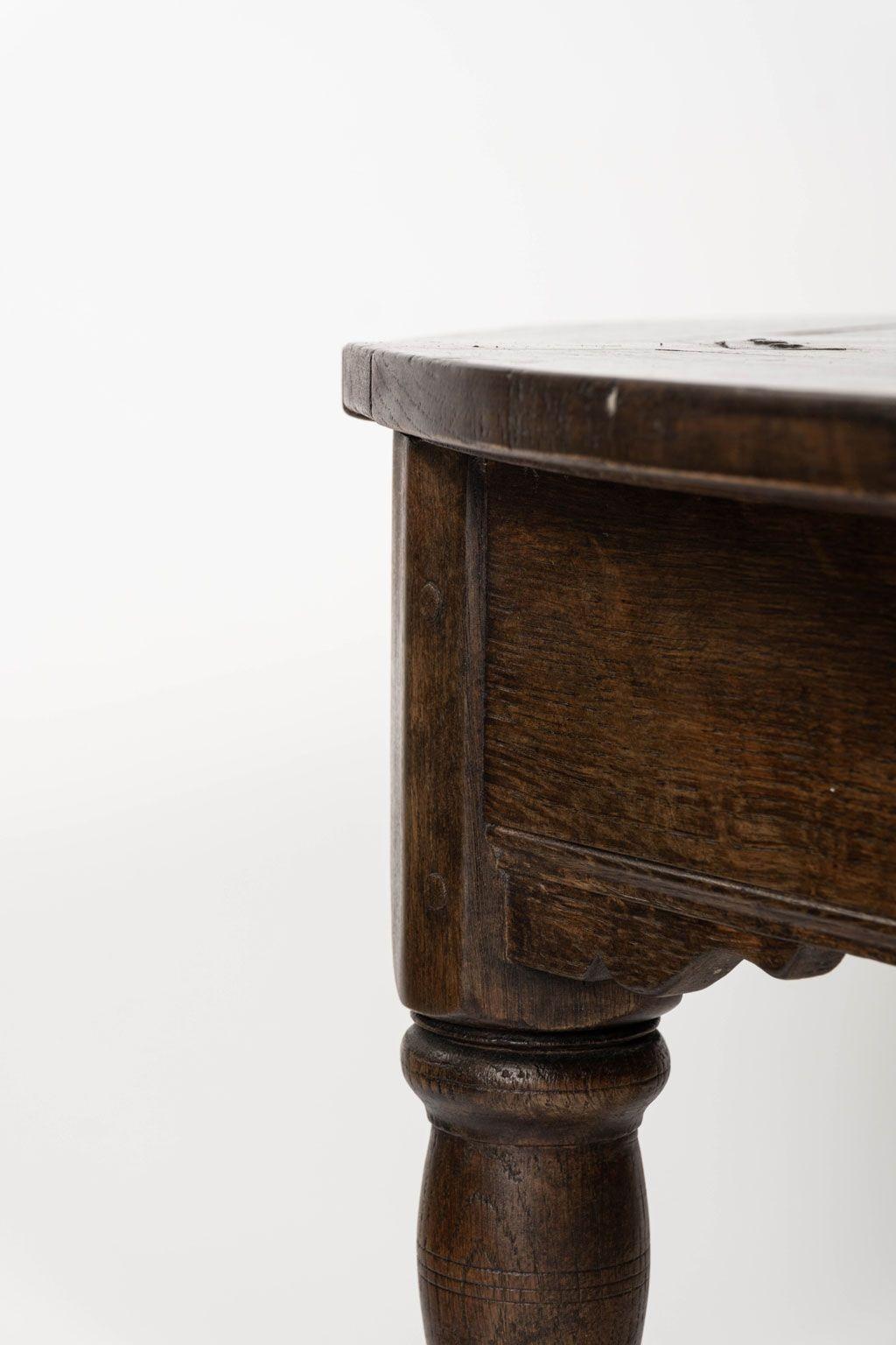 Italian flip-top Italian marquetry table hand-carved in oak circa 1760-1789. Mortise and tenon joints with turned legs. Rear gate-leg swings out to support top when open as a round table.

Table measures 29 inches high and 49 inches diameter when