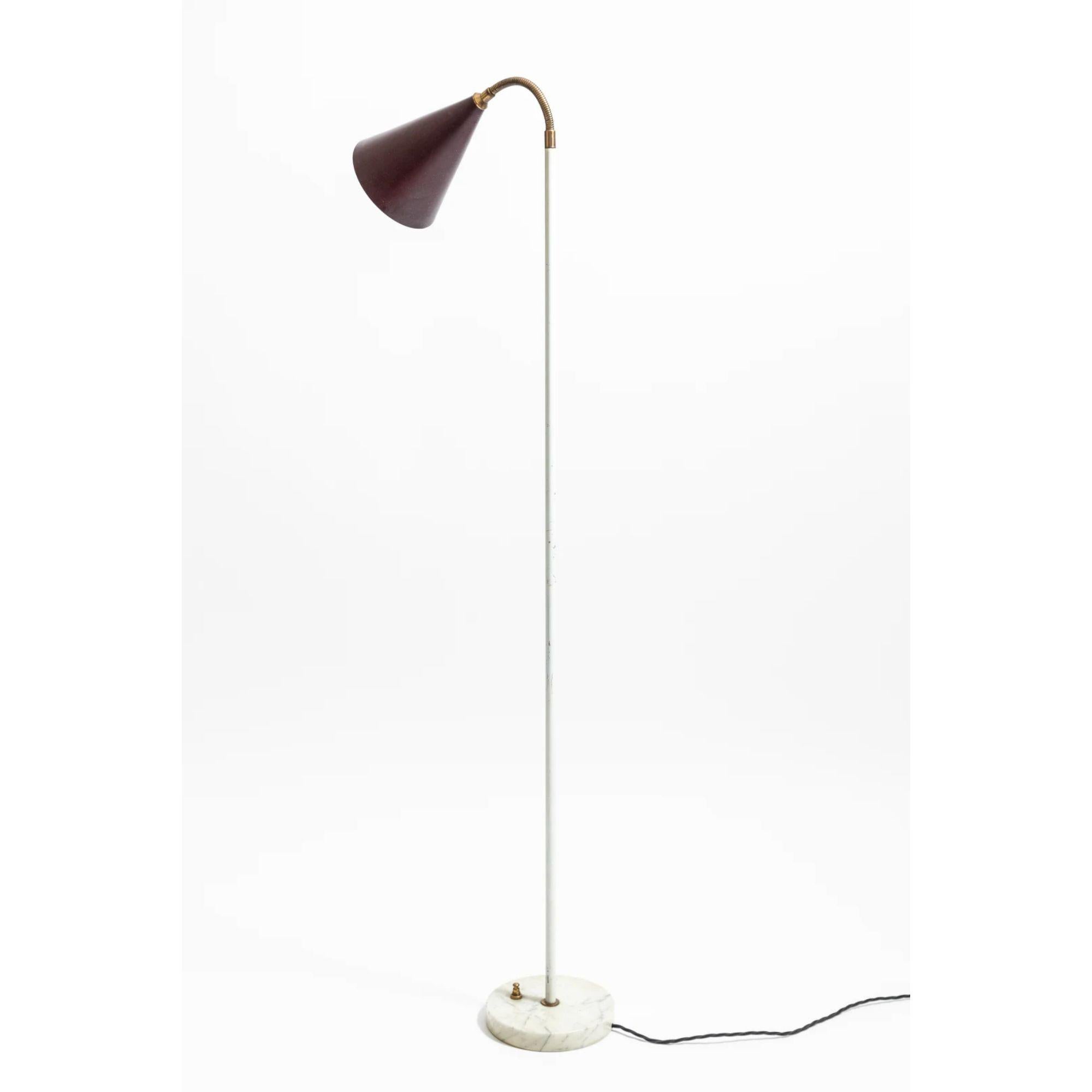 Italian floor lamp by Angelo Ostuni, 1950s.

Ostuni exhibited at Moma as part of 'New Design Trends' 25 March to 1 June 1952. Le Corbusier (Charles-Édouard Jeanneret), Alvar Aalto, Anni Albers and Greta Daniel, among others, also exhibited in the