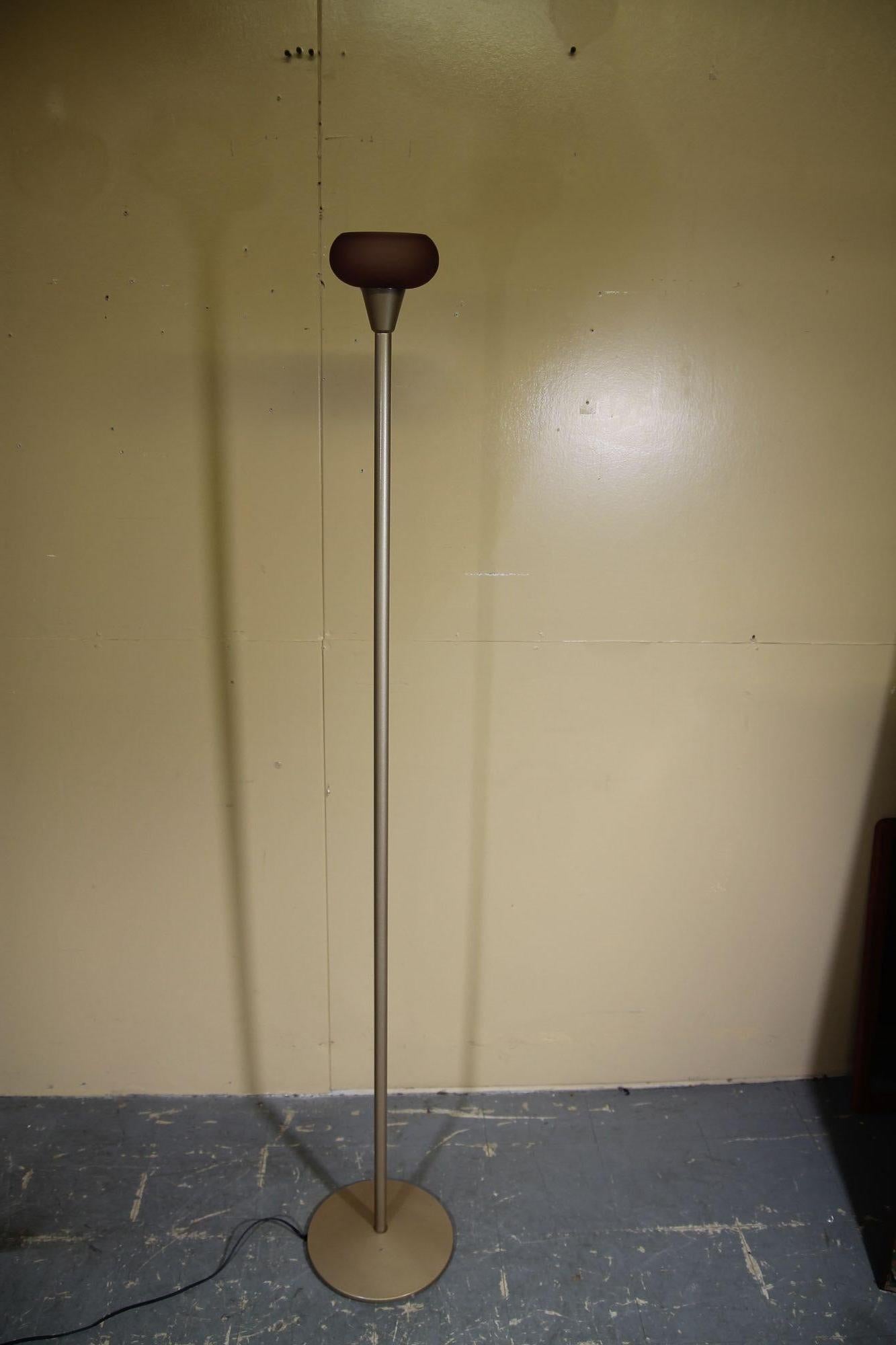 Rare Italian floor lamp by Leucos. This light gold base and rod look great with this small purple glass shade. This lamp comes with a dimmer switch. Shade is 5.5 in diameter and 2.5 tall. This lamp looks great in an decor. The lamp came from a long
