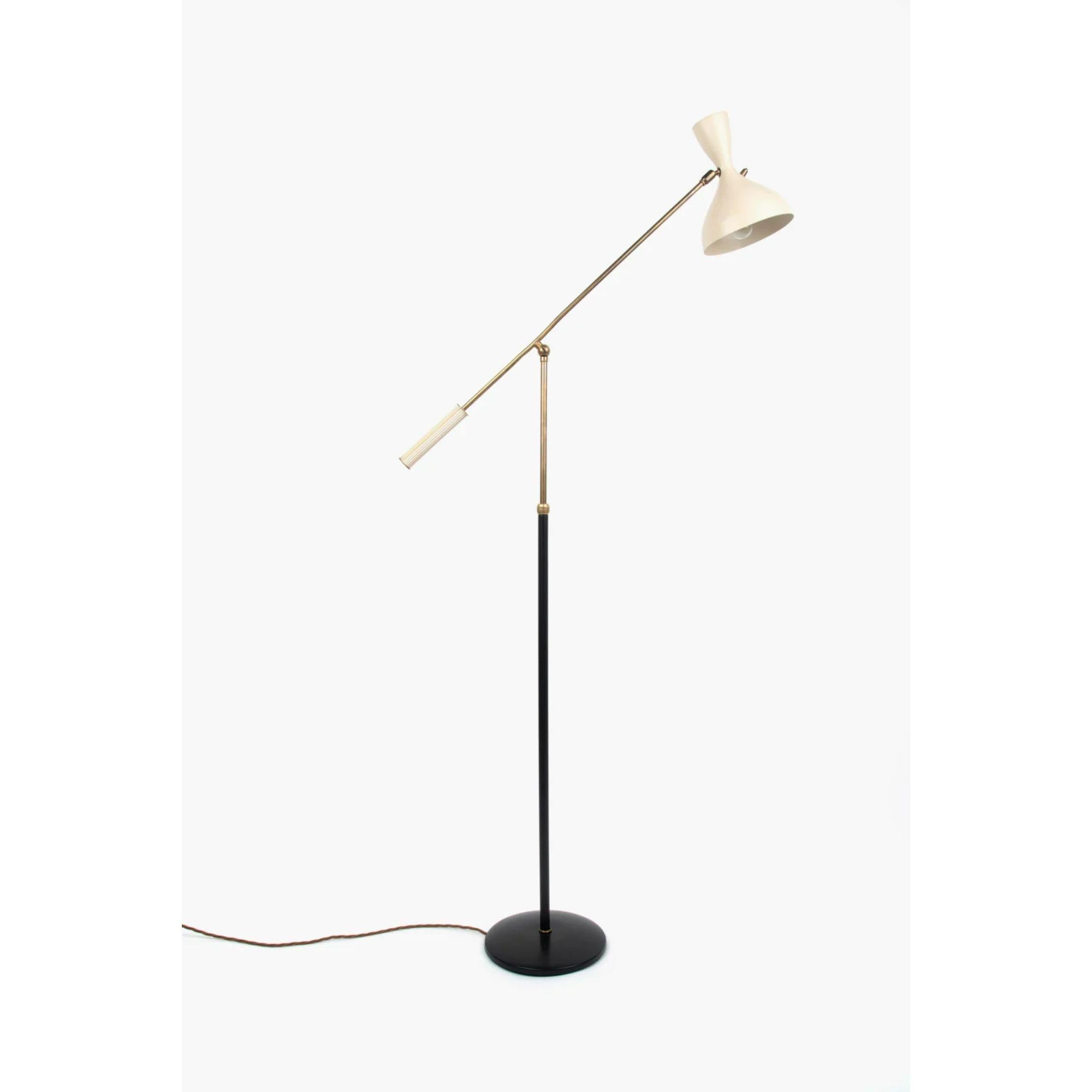 Italian floor lamp by Lumen Milano, 1950s.

1950s Italian floor lamp manufactured by Lumen.

Brass metalwork with details painted in black and cream, and a cream painted aluminium 'diablo' shade.

The shade and counter-balanced arm are fully