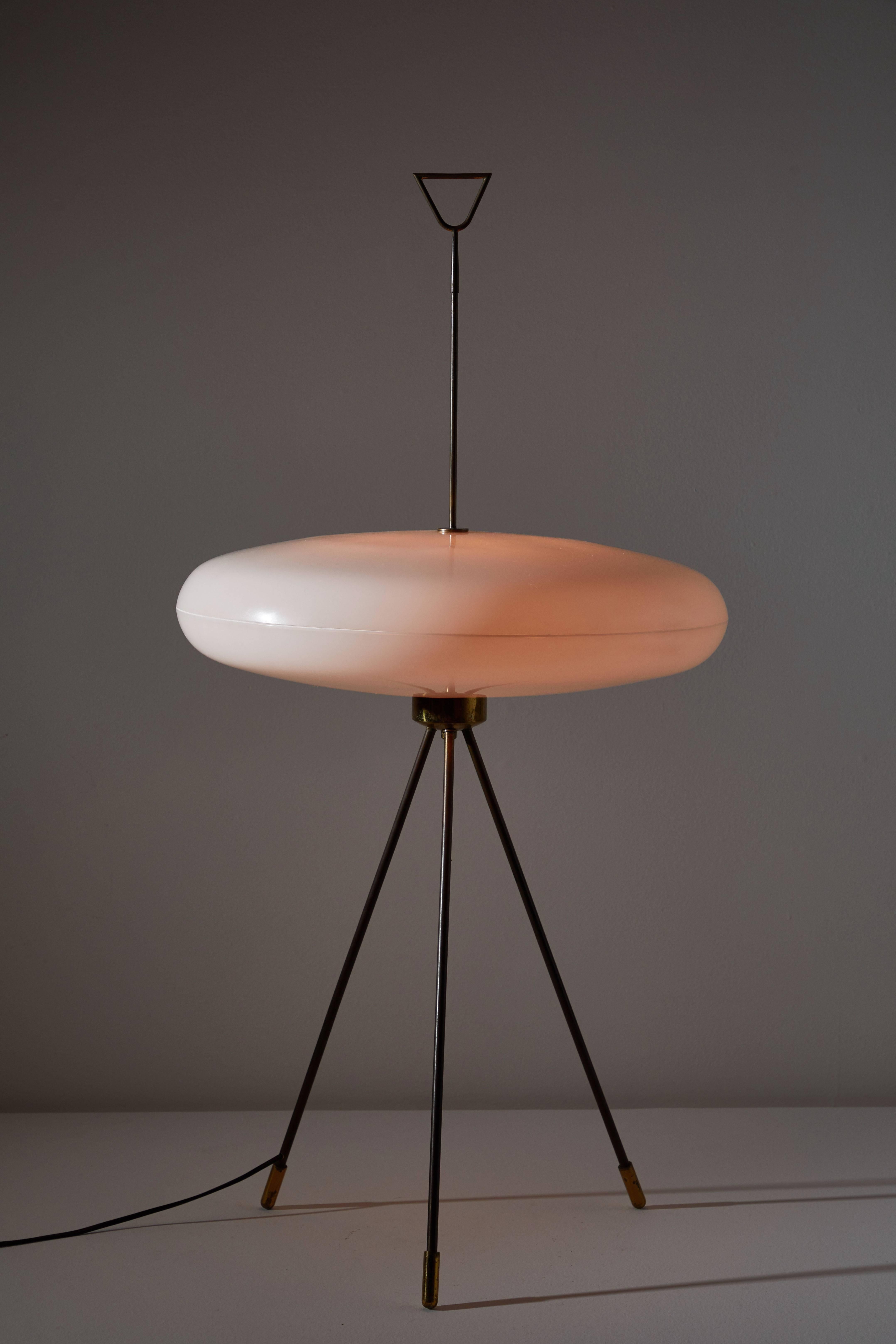 Floor lamp in the style of Gio Ponti. Designed and manufactured in Italy, circa 1950s. Resilient, substantial acrylic diffuser and brass. Original cord. Takes three E27 25w maximum bulbs.