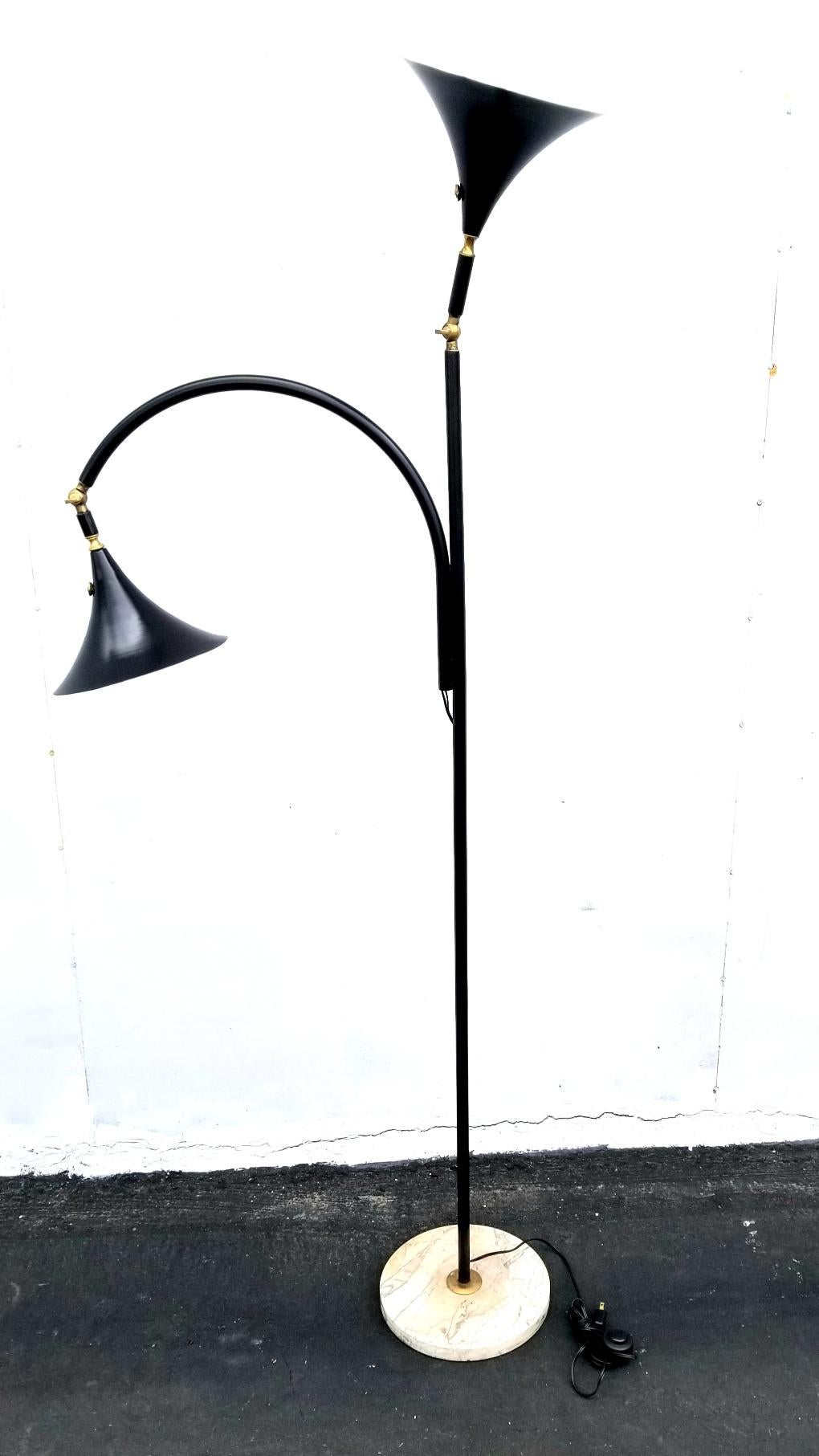 Italian floor lamp with two pivoting shades and marble base. Brass neck allow to change the position of the shades.