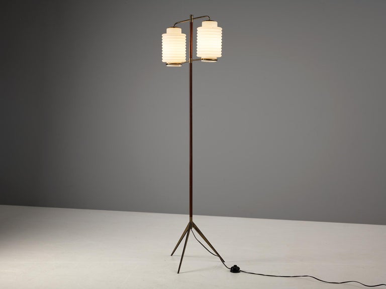 Floor lamp, brass, vinyl, glass, Italy, 1960s. 

Unique Italian floor lamp that features an interesting combination of materials and shapes. Alltogether, this floor lamp resembles the exterior of an Asian lampion. Its stem and tripod base are