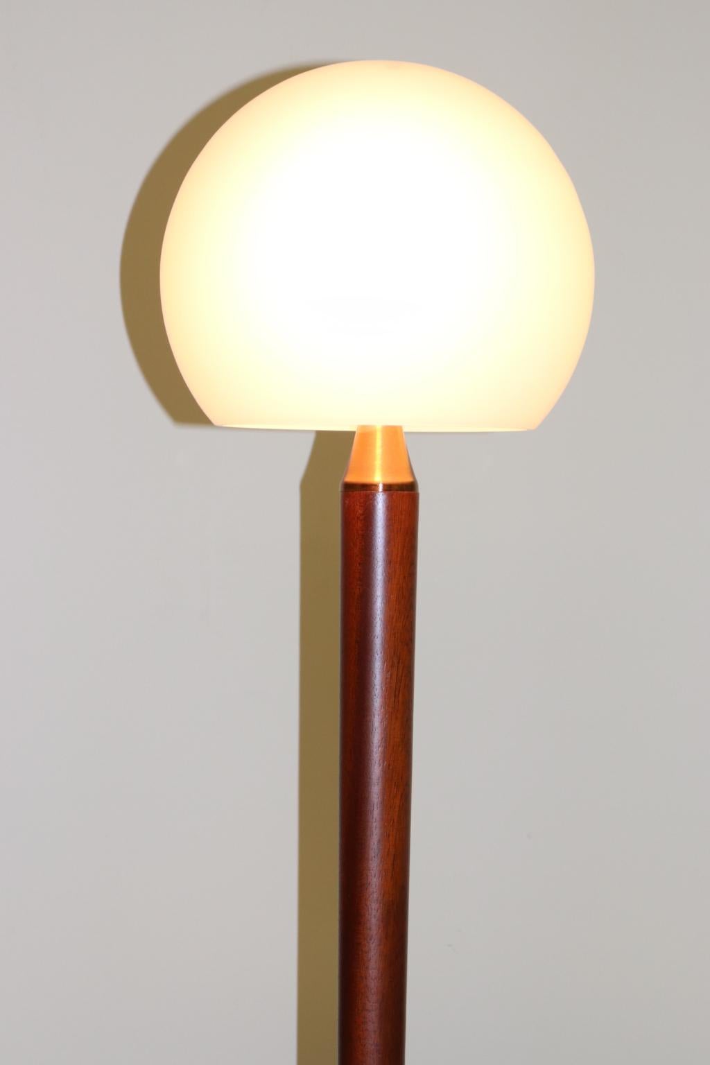 Italian floor lamp, white hand blown Murano glass diffuser, solid mahogany stem and brushed copper base and details, clear lacquered to prevent copper oxidation. The 