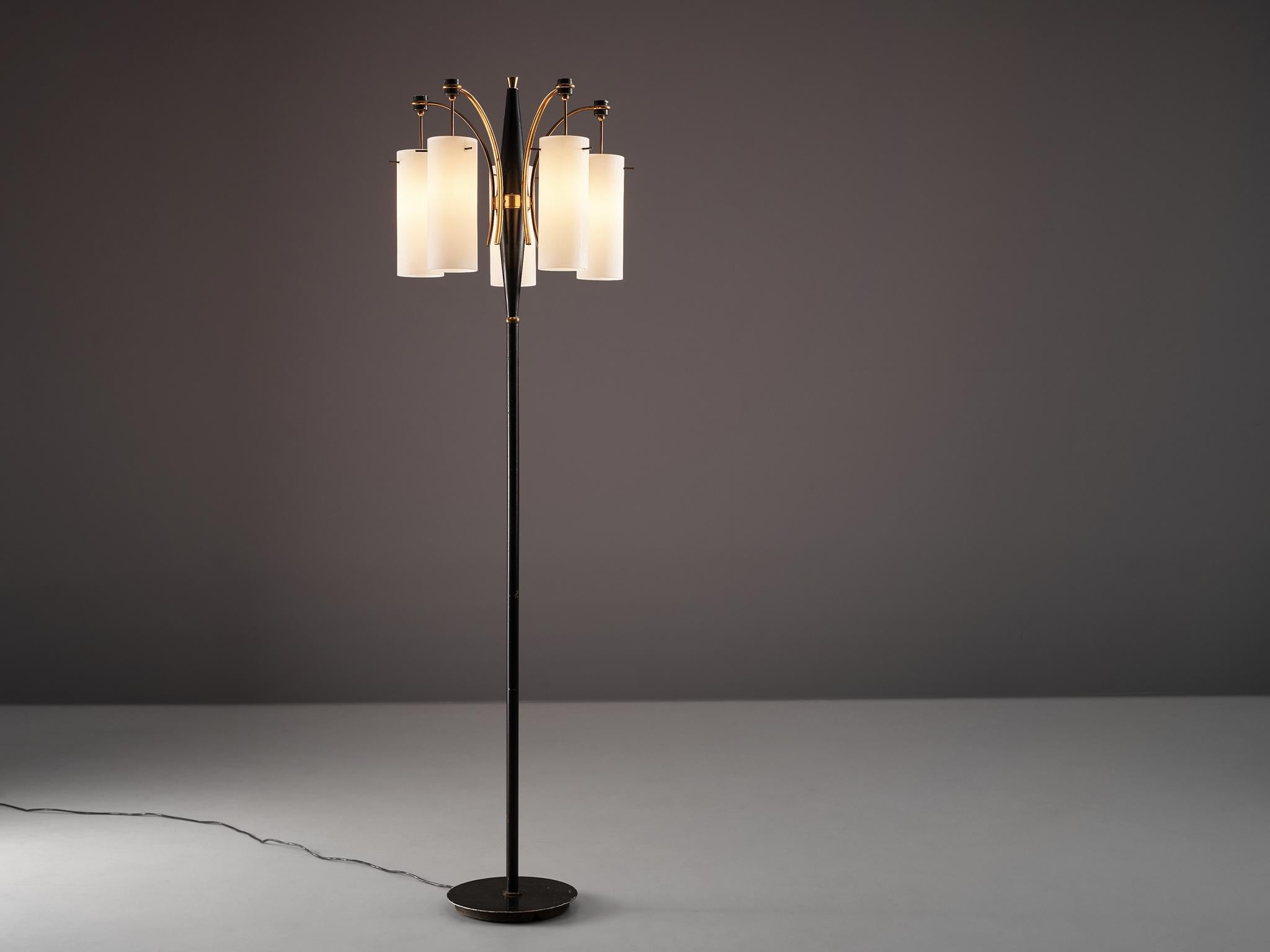 Italian floor lamp, metal, brass, glass, Italy, 1960s

A black metal stem holds five cylindrical shades in white opaline glass. The shades are hanging on a brass connection. On the height of the shades the stem features brass detailling as well as