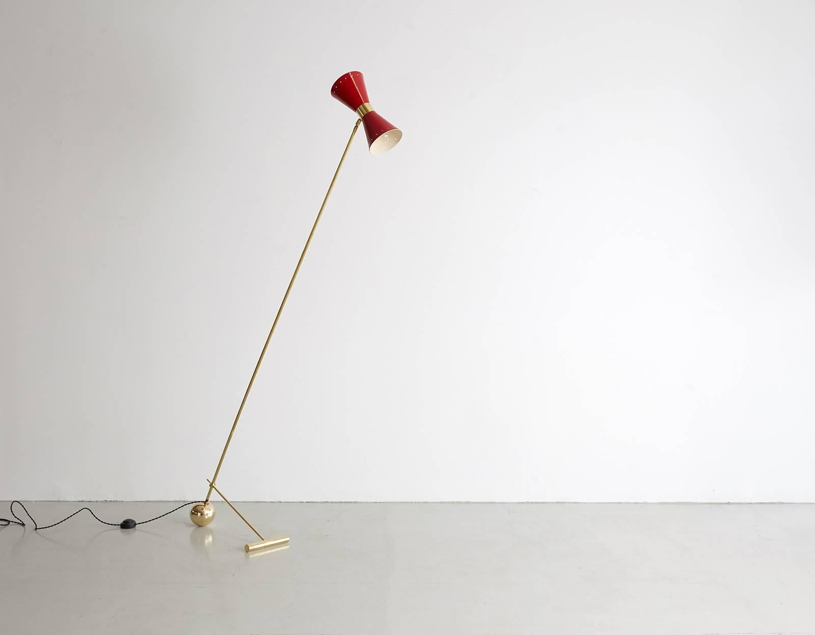 Italian floor light in the style of Stilnovo with articulating red shade, brass stem and counter weight ball foot. Newly produced in Italy and newly rewired.