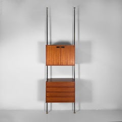 Italian floor to ceiling bookcase in wood, black metal and brass, 1960s