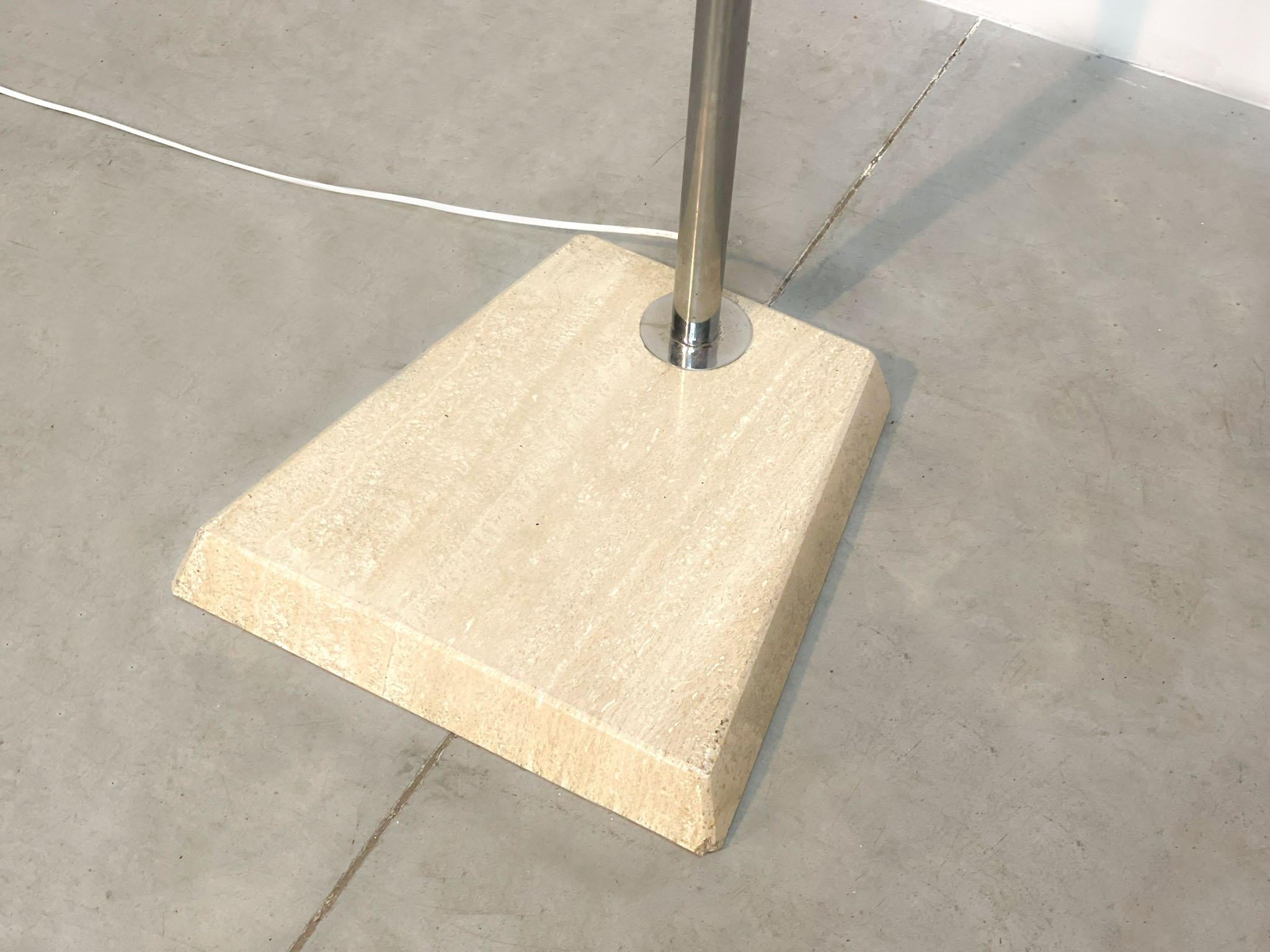 Italian floorlamp with travertine base
Very versatile and stylish Italian floor lamp, made in the 70's in Italy by an unknown manufacturer. Nevertheless it is a beautiful quality floor lamp! You can put the lamps as you wish.

 

The stylish