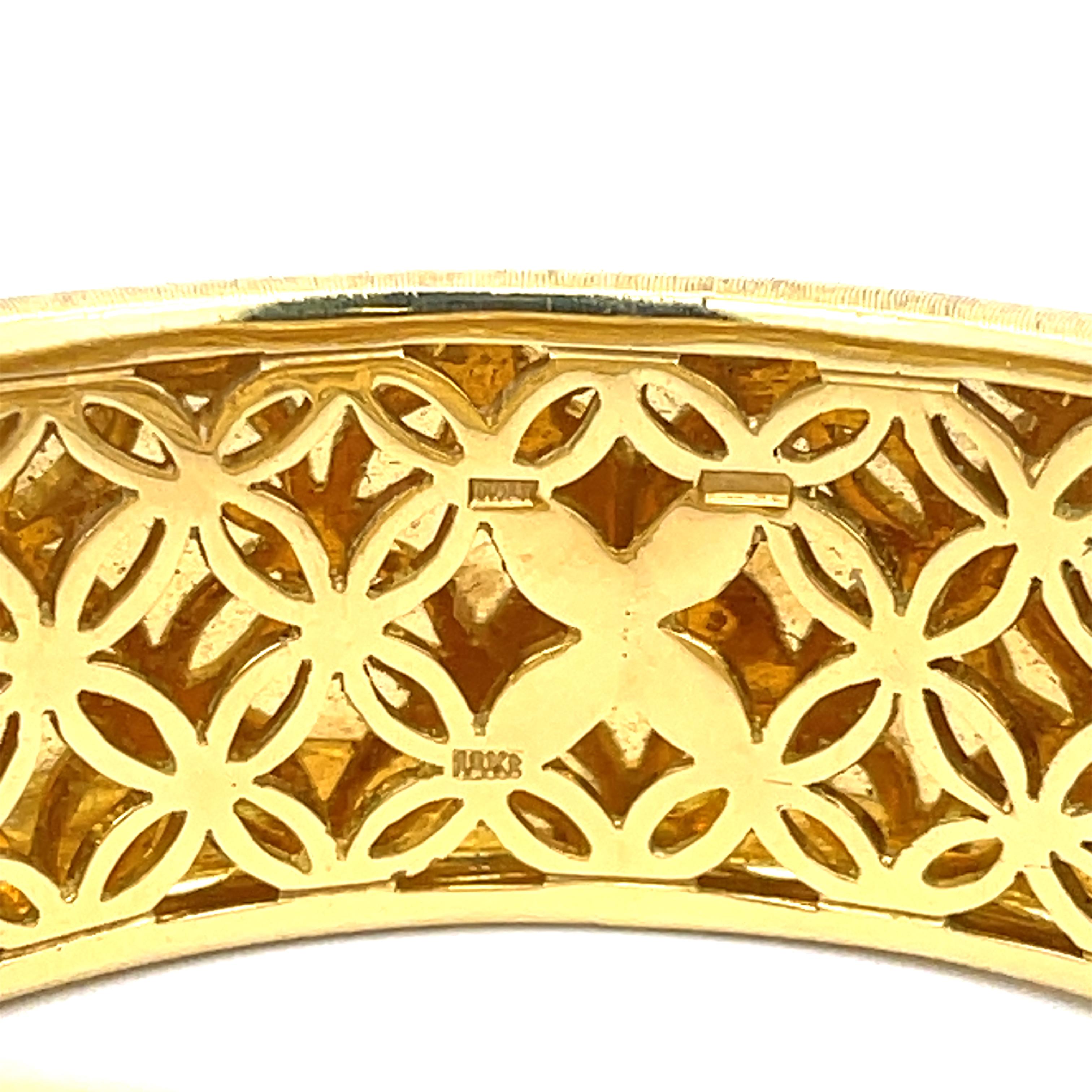 Italian Florentine Diamond Cuff in 18K Yellow Gold. The cuff features 1.60ctw of brilliant round diamonds, G-H in color, VS clarity. The cuff is hinged and has an invisible clasp. About 1.50 inches at widest point, tapering down to 0.75 inches, 7