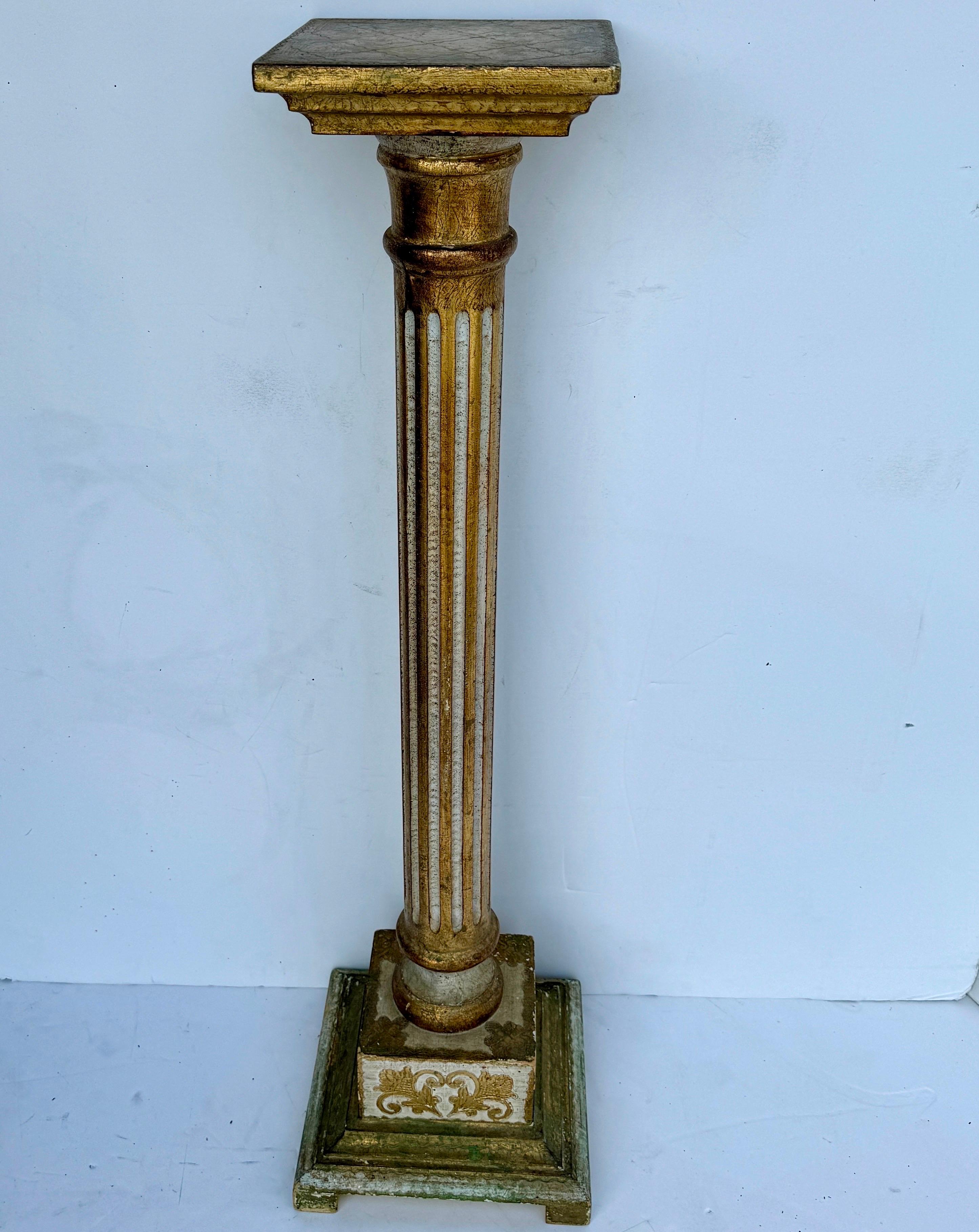 Mid-Century Modern Period Florentine Gold Gilt and Cream Pedestal, circa 1950-60's Italy.

Classic and versatile Florentine Mid-Century stand. Can be a stand-alone statement piece or functional to hold a plant in any formal or informal home setting.