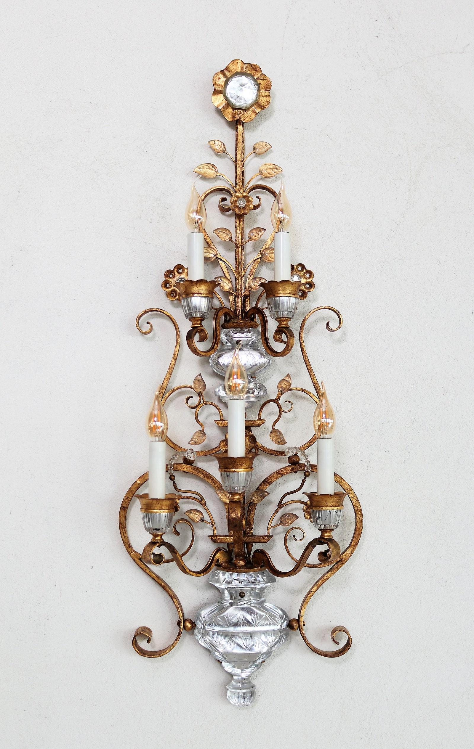 A magnificent pair of large Florentine wall lights handcrafted expertly in the form of a flower pot with climbing flowers. 
Handcrafted one by one from artisan company Banci of Florence, Italy, in the 1960s. 
These lights are often sold under the