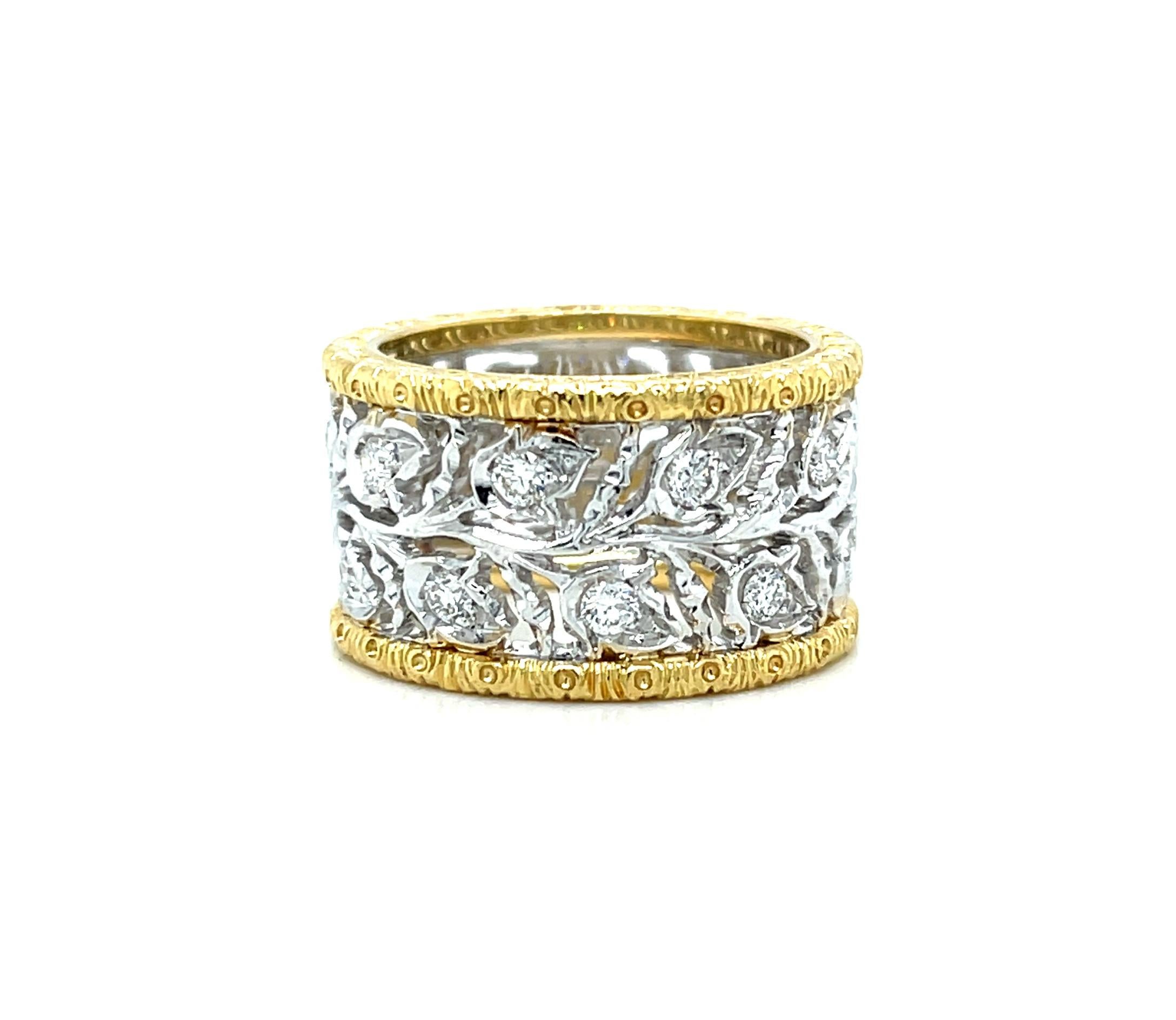 This handmade Florentine style band was created by our artisan jewelers in Italy and displays a superior level of quality and craftsmanship. 18k white gold openwork covers the entire surface of the wide band, and engraved 18k yellow gold edges on