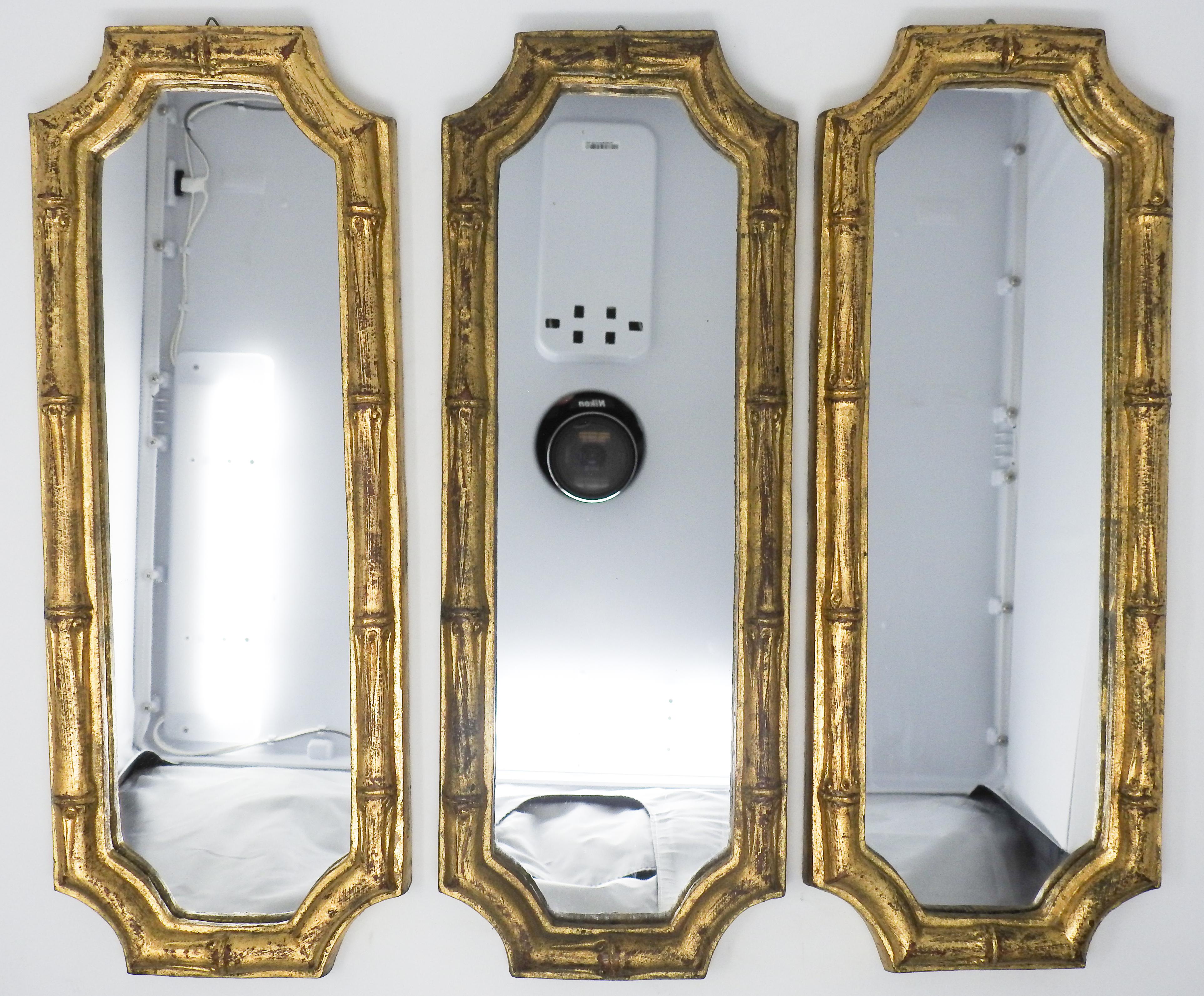 Offering this set of three, Italian Florentine bamboo style mirrors. These are all marked with the same style number, one of them the gilt seems to be darker than the other two. They are done in the faux bamboo look. Each of them still have the