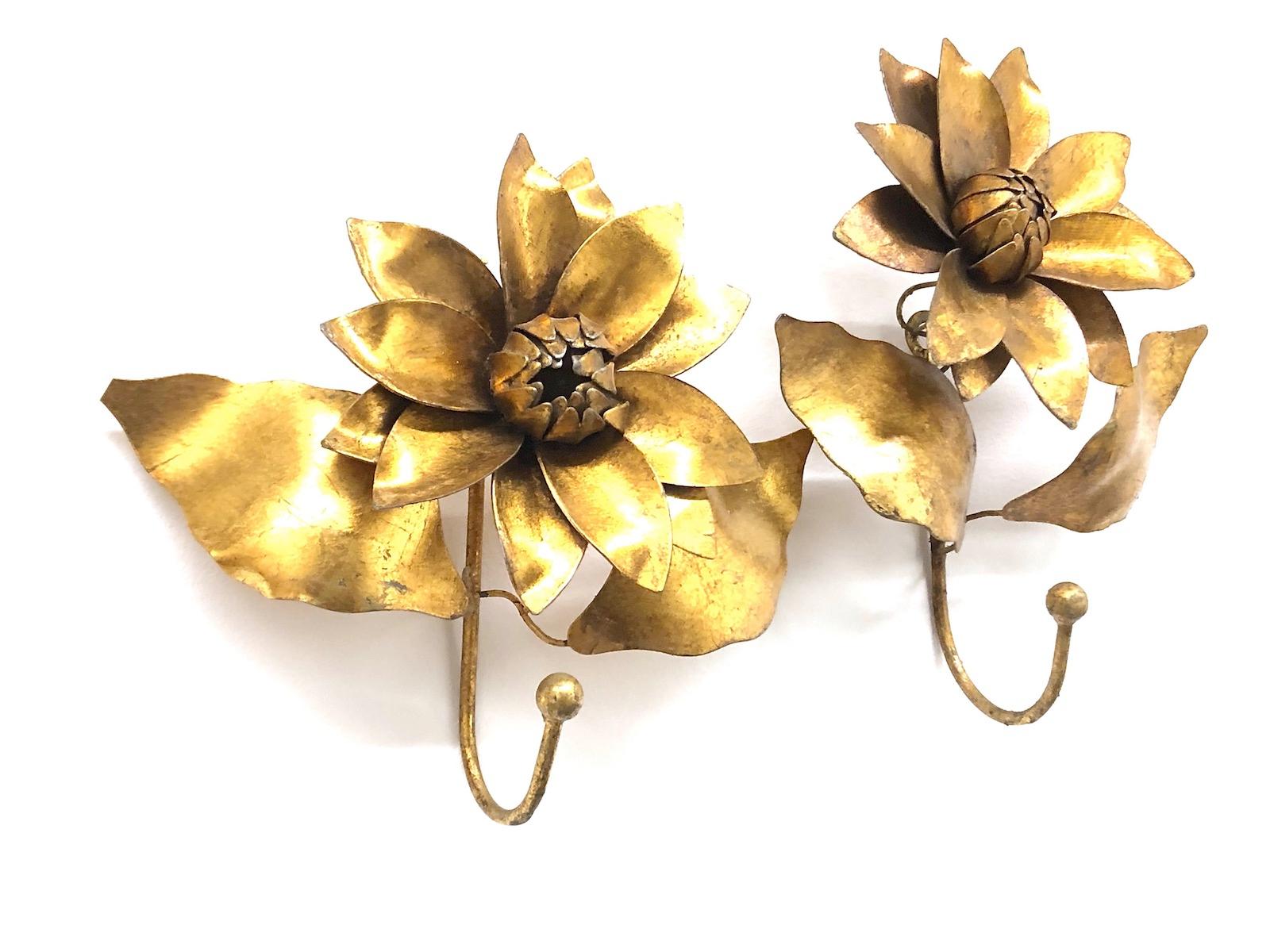 Offered is an absolutely stunning, 1950s Italian gilt metal coat hook set for your Hall entry. Minor patina and paint lost gives these pieces a classy statement. Measurements tall one: 9 1/2