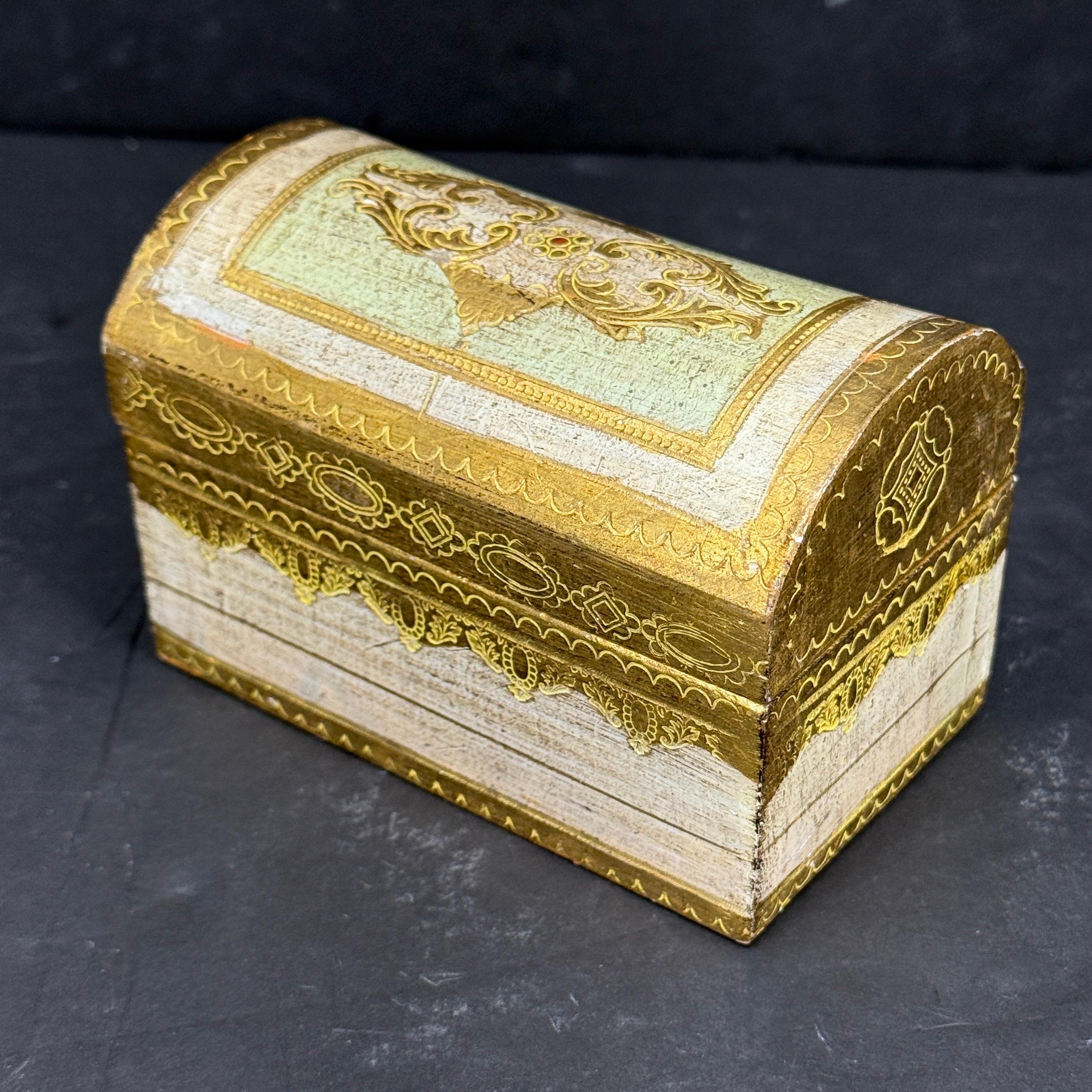 Charming Italian Florentine Box. This 1960's box has been hand-painted in soothing green and ivory white and could be used for storage or jewelry and would certainly look great on a coffee or side table. Great piece to add to a collection of these
