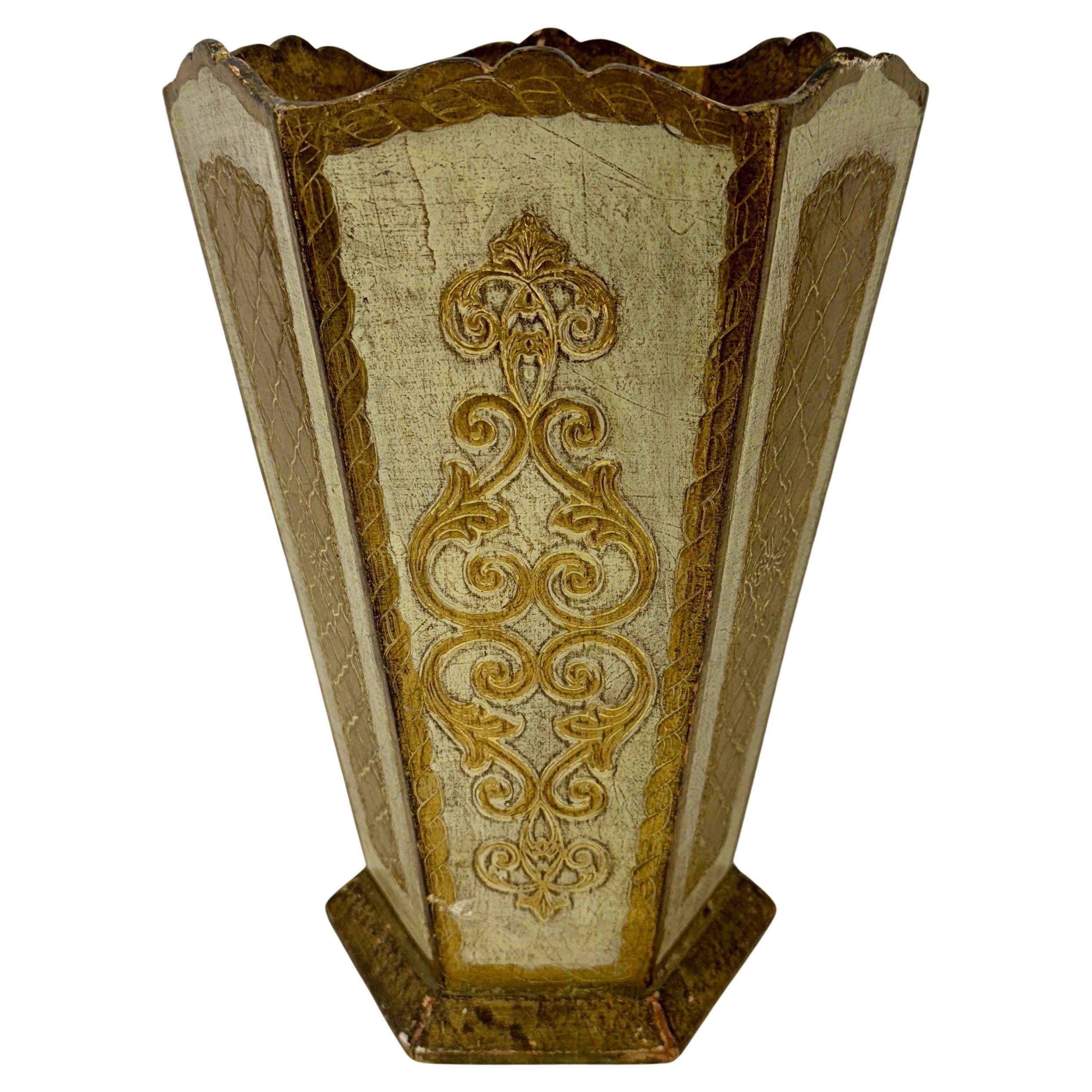 Vintage Italian Florentine Gold and Cream Wooden Wastebasket

Charming tall gilded wastebasket or trash can Made in Italy. Perfect to be used formally or informally in a bathroom, powder room, vanity space or home office. Truly a vintage ornate