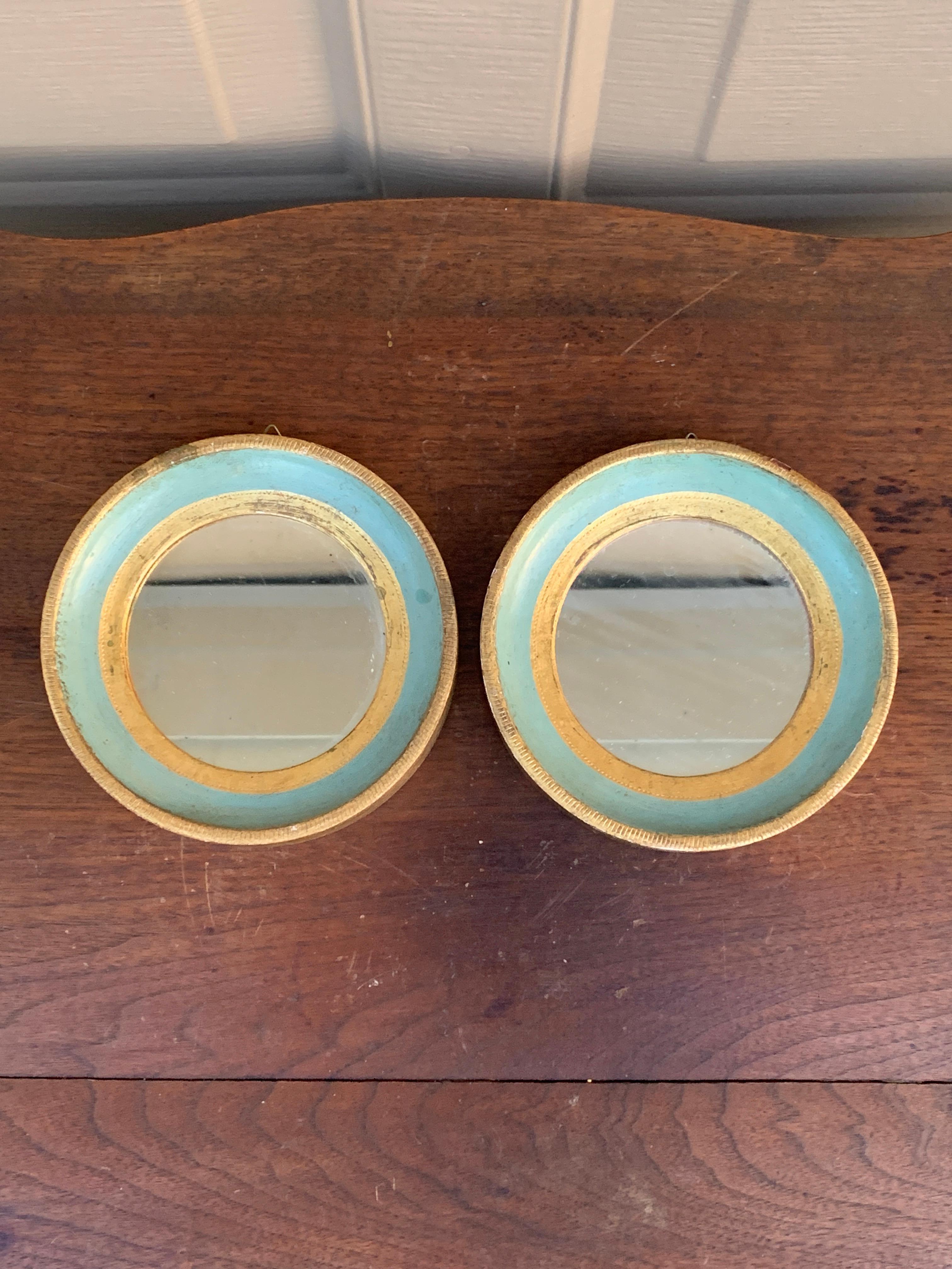 A stunning pair of Italian Florentine painted round wall mirrors

Italy, Circa 1950s

Hand painted green and gold giltwood frames, with original mirror.

Measures: 5.5