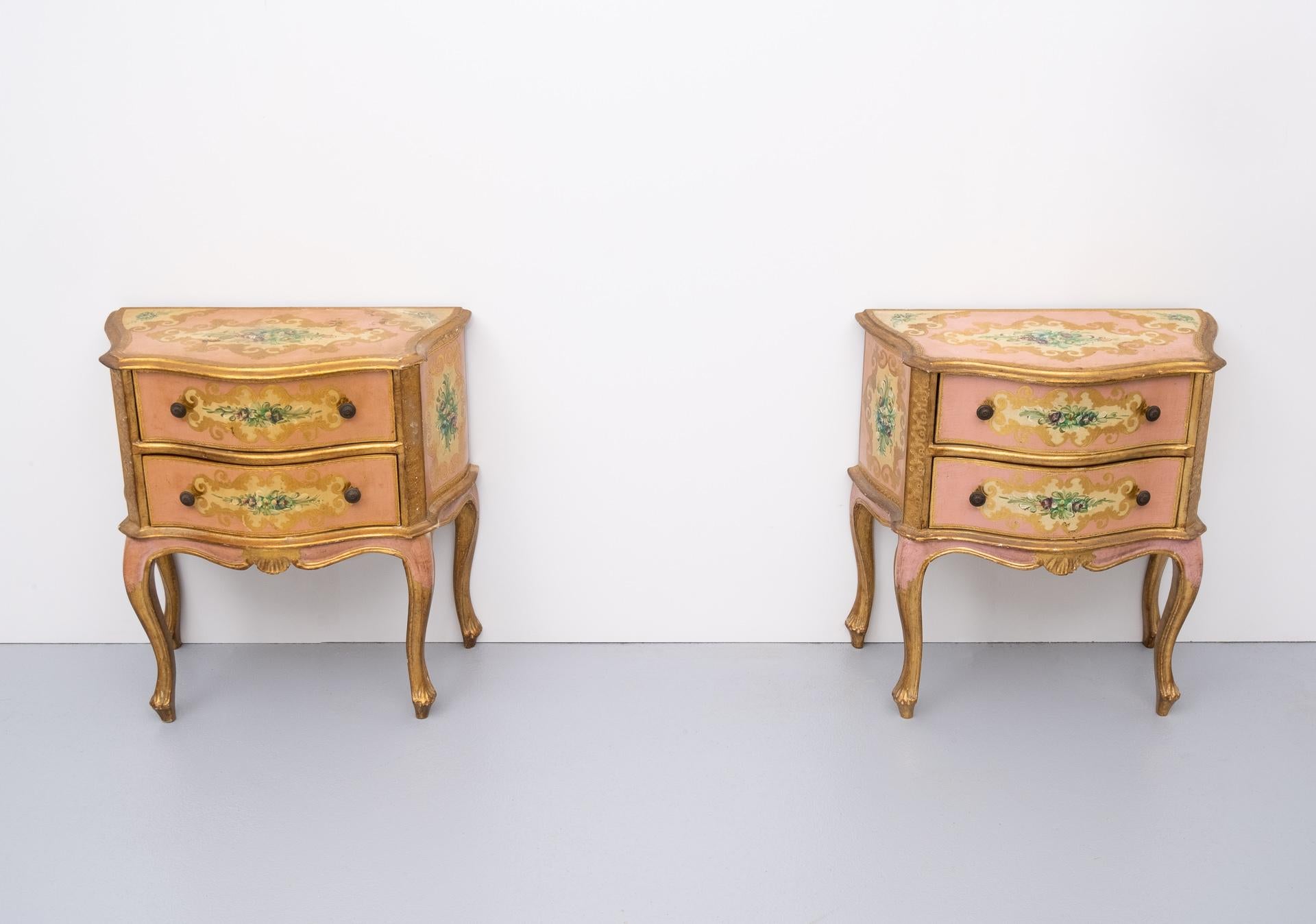 Two very nice Italian Florentine nightstands. Pink base color, gilded wood, hand painted flowers.
Two drawers each.