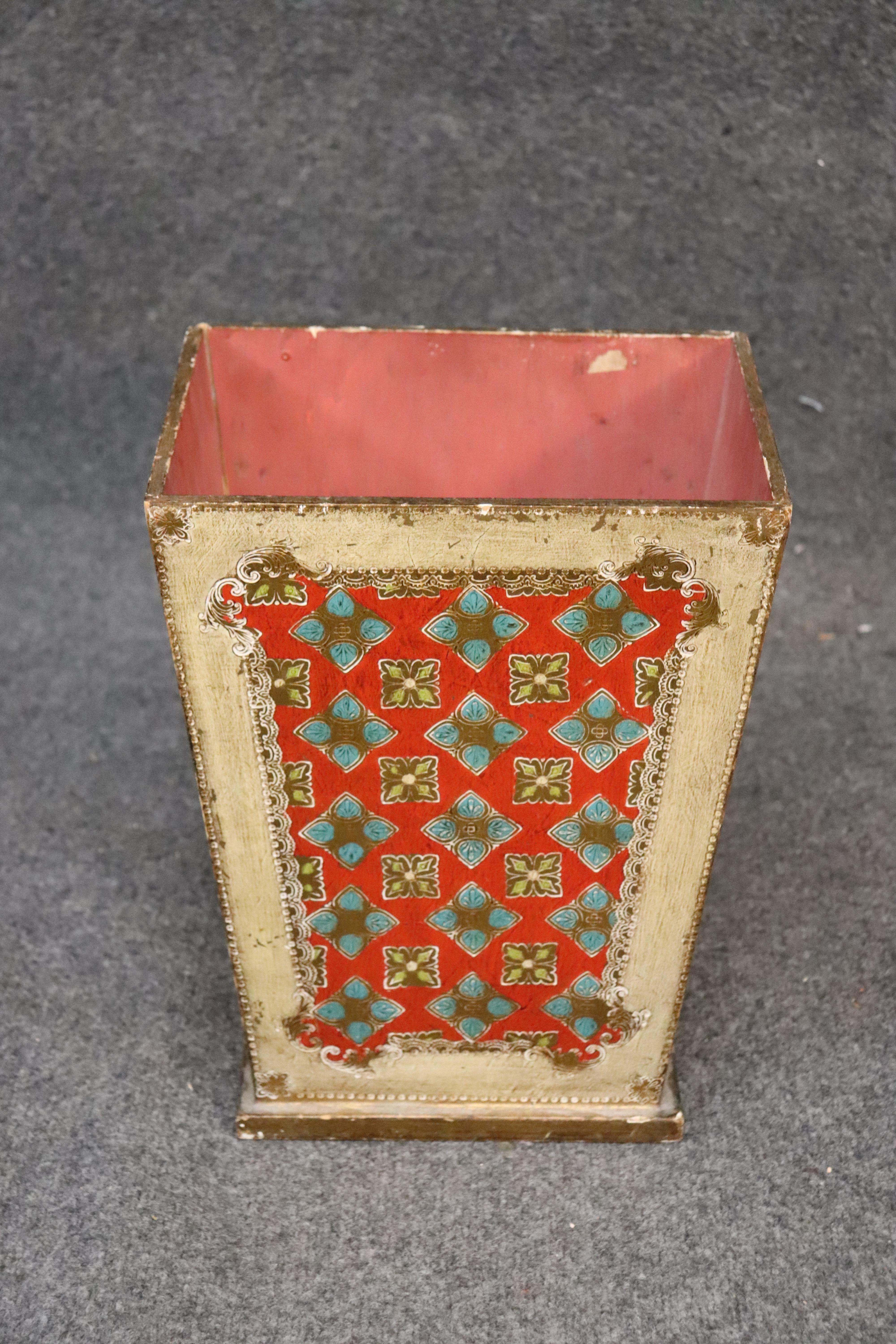This is a gorgeous Florentine waste paper basket that is perfect for am office or even a powder room. The dimensions are 14 inches tall x 11 inches wide x 9 inches. Dates to the 1940s.