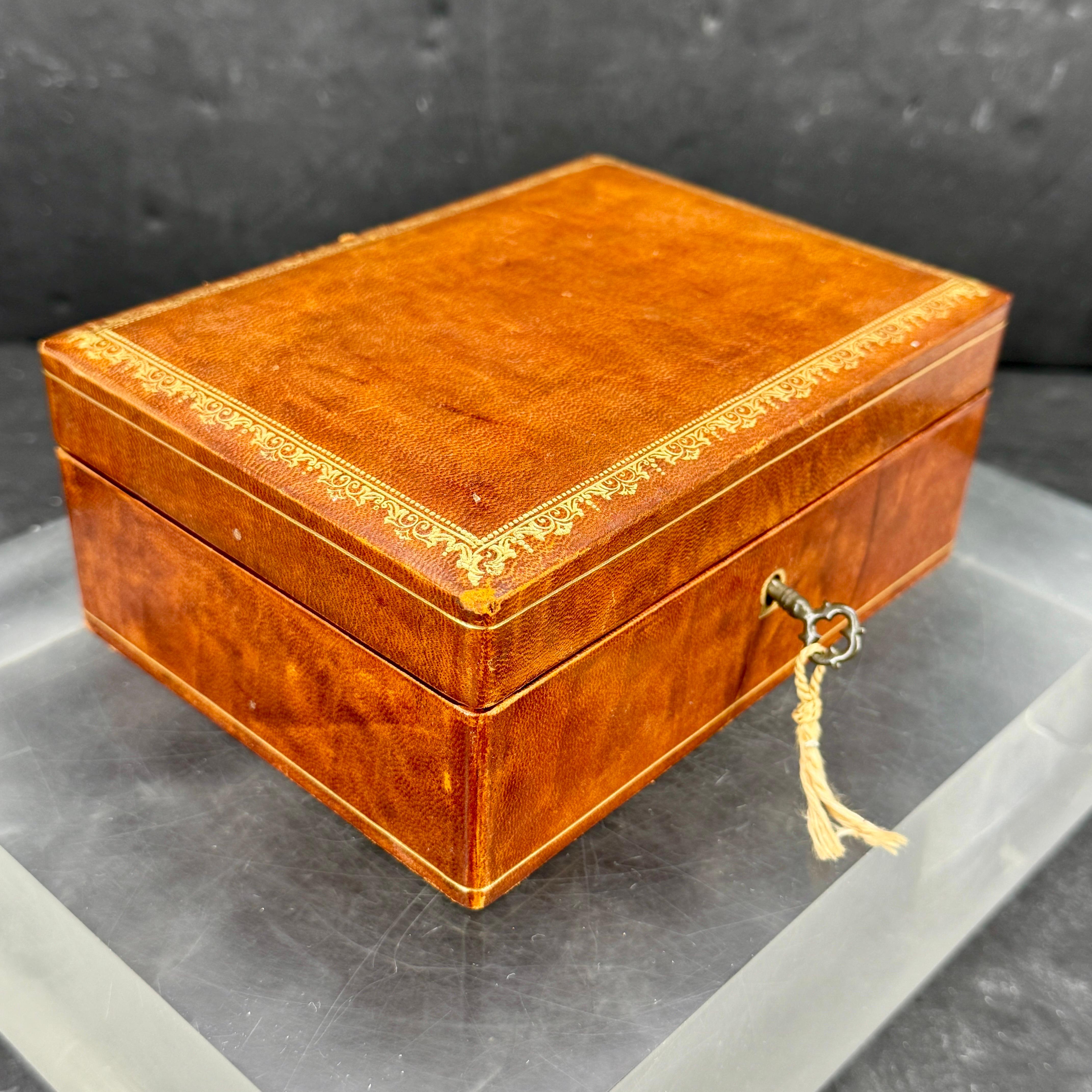 Hand-Crafted Italian Florentine Rectangular Gold Embossed Leather Box with Lock and Key For Sale